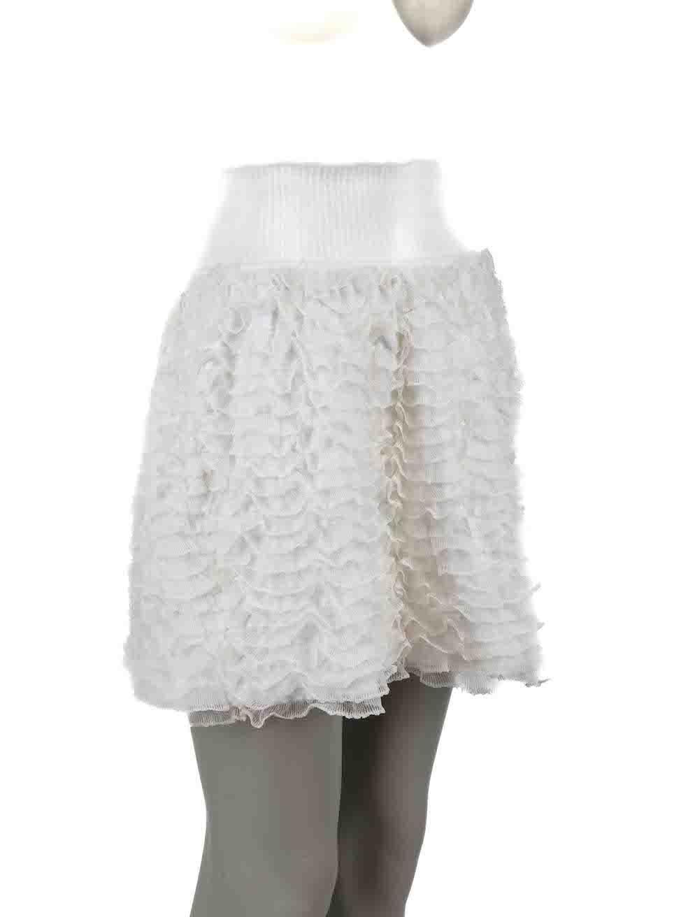 CONDITION is Very good. Hardly any visible wear to skirt is evident on this used Ala√Øa designer resale item.
 
Details
White
Viscose
Skirt
Mini
Ruffle layers
Elasticated waistband
 
Made in Italy
 
Composition
50% Viscose, 23% Silk, 14% Polyester,