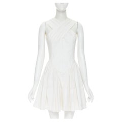 ALAIA white geometric laser cut cotton crossover strap flared mini dress FR40