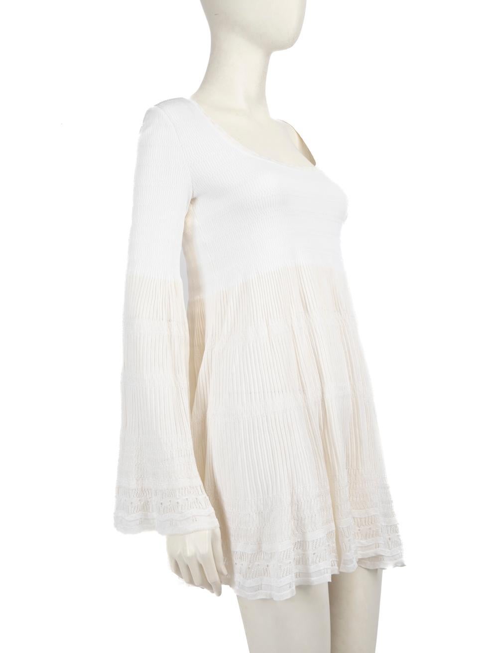 CONDITION is Very good. Hardly any visible wear to the dress is evident on this used Alaïa designer resale item.
 Details
 White
 Viscose
 Dress
 Mini
 Long sleeves
 Stretchy
 See- through
 Lace Pattern
 Round neck
 
 
 Made in Italy
 
 Composition
