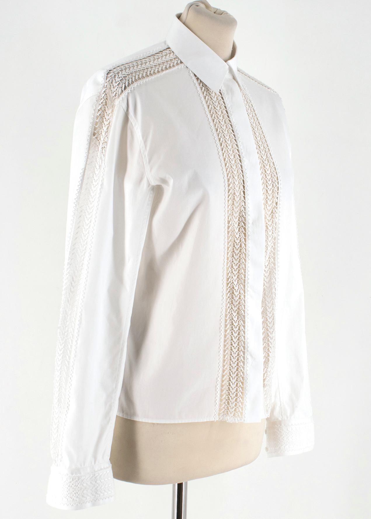 Alaia White poplin shirt with detailing at front and on sleeves featuring button fastening.

- Made in Italy
- Dry clean only

Please note, these items are pre-owned and may show signs of
being stored even when unworn and unused. This is reflected