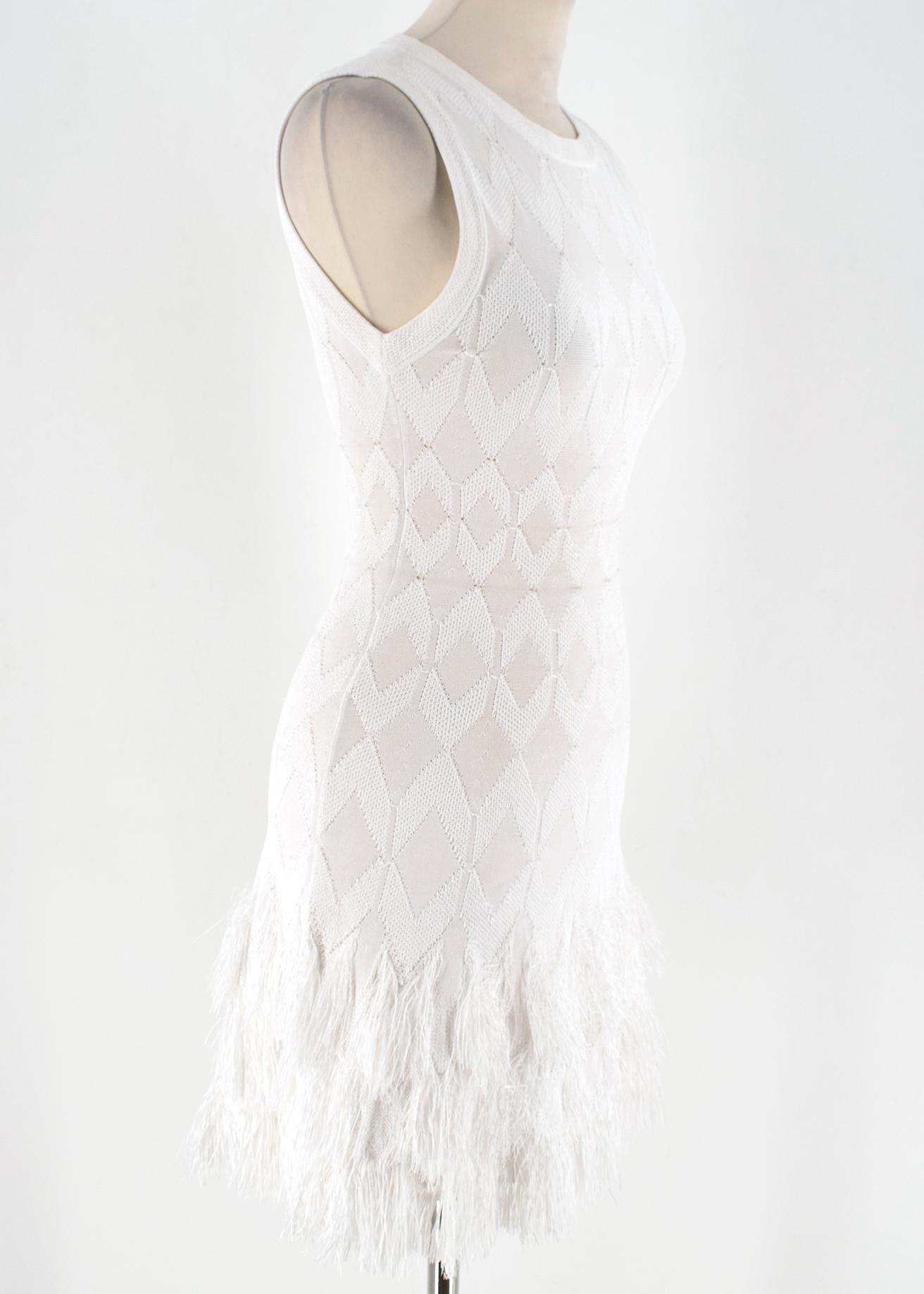 Alaia White Sleeveless Mini Dress 

Sleeveless white dress,
Round neck, 
Side zip fastening, 
Dramatic frayed hem design, 
Slight stretch material,
Lightweight 


Please note, these items are pre-owned and may show some signs of storage, even when