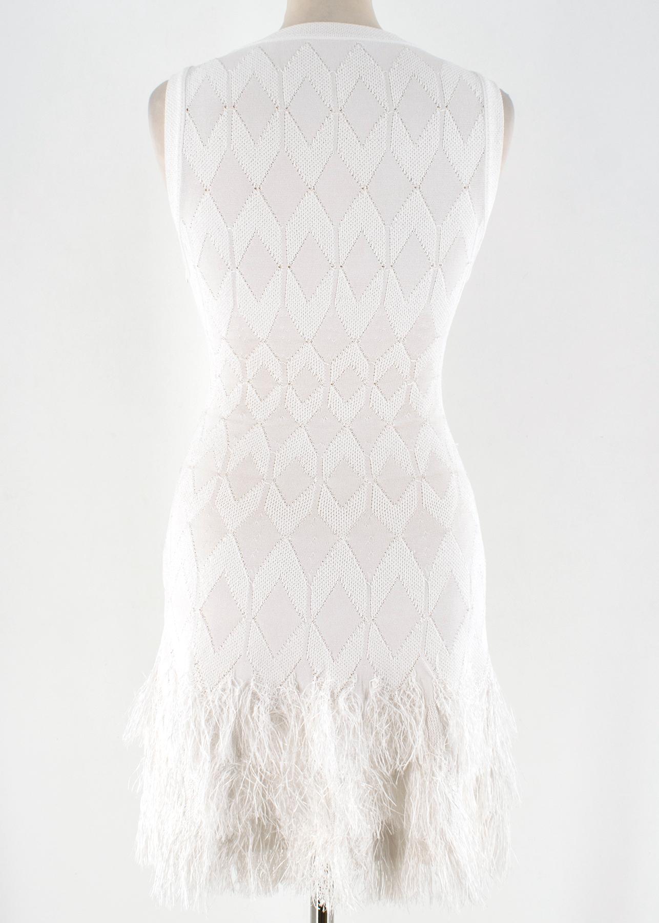 white sleeveless knit dress