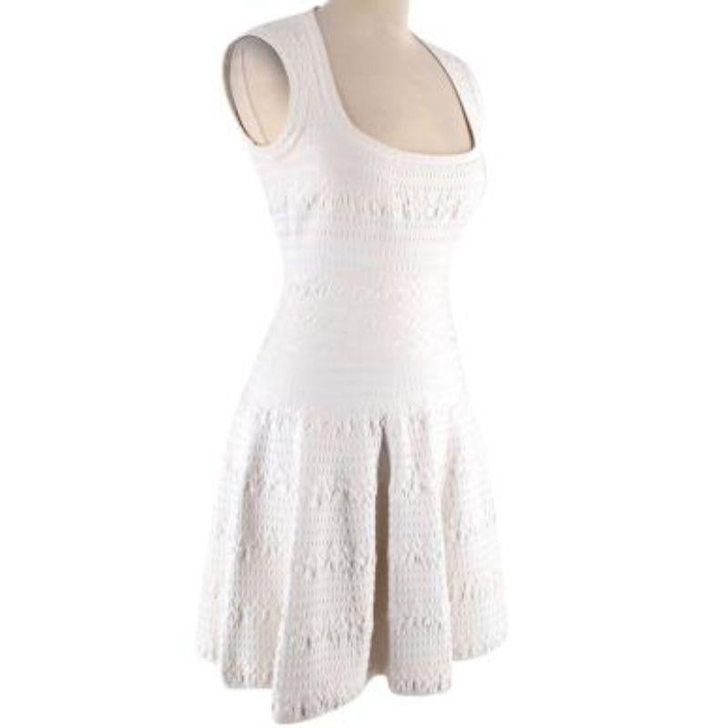 Alaia White Sleeveless Knitted Skater Dress

- Sleeveless
- Zip fastening in the back
- Scoop neckline
- Flared detailing
- Elasticated fabric

Material
75% Viscose
15% Polyester
5% Polyamide
5% Elastane

Dry clean only

Made in Italy

9.5/10