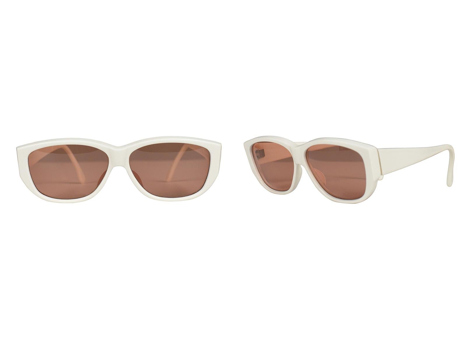 Resurrection Vintage is excited to offer a pair of vintage Azzedine Alaia white sunglasses with peach-tinted lenses. 

Azzedine Alaia Paris
One Size

Very Good Vintage Condition
Wear Consistent With Age
Authenticity Guaranteed 