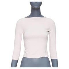 ALAIA jersey blanco en mezcla de viscosa con mangas recortadas y cuello barco FR36 S