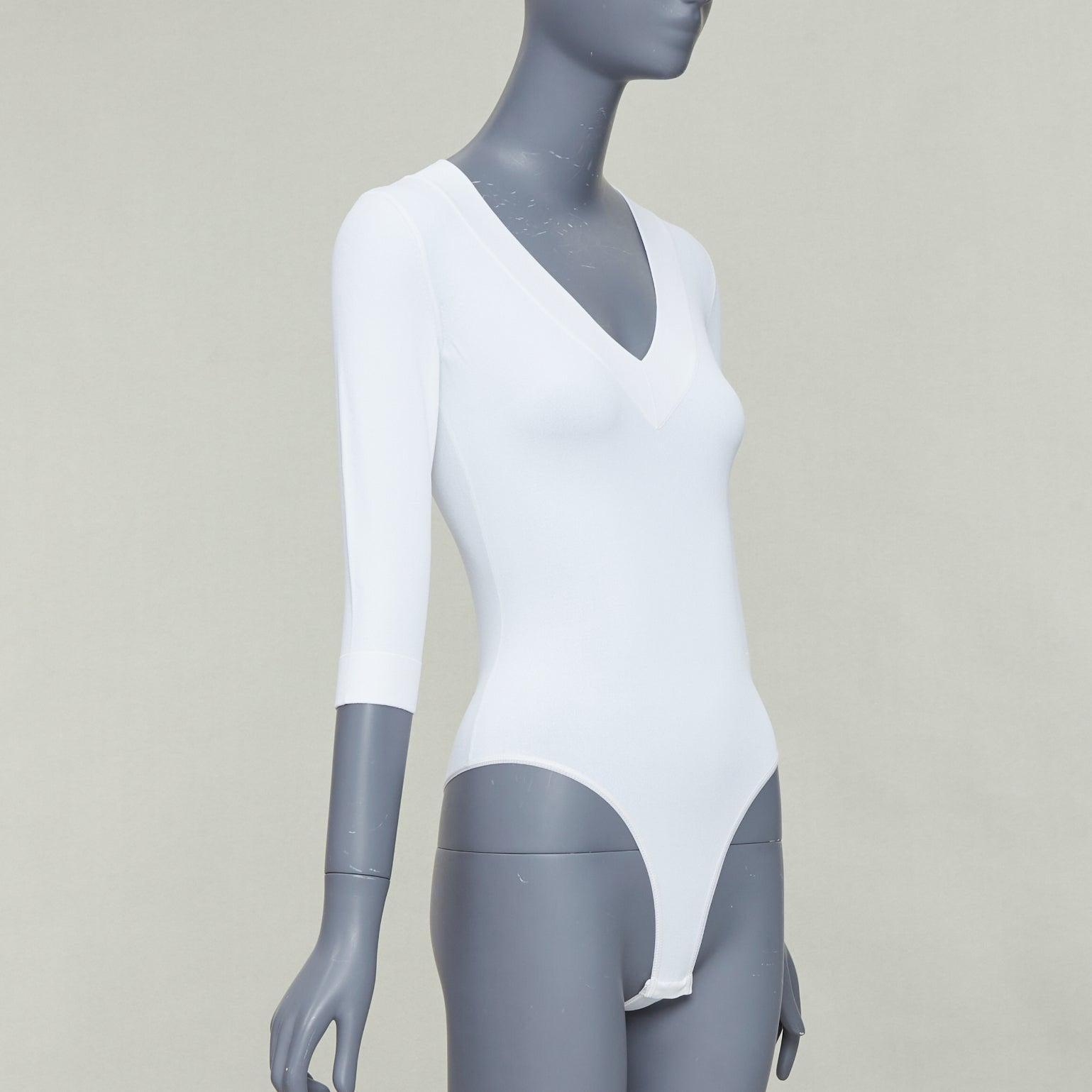 ALAIA top blanco con cuello en pico y mangas 3/4 en mezcla de viscosa FR36 S Púrpura en venta