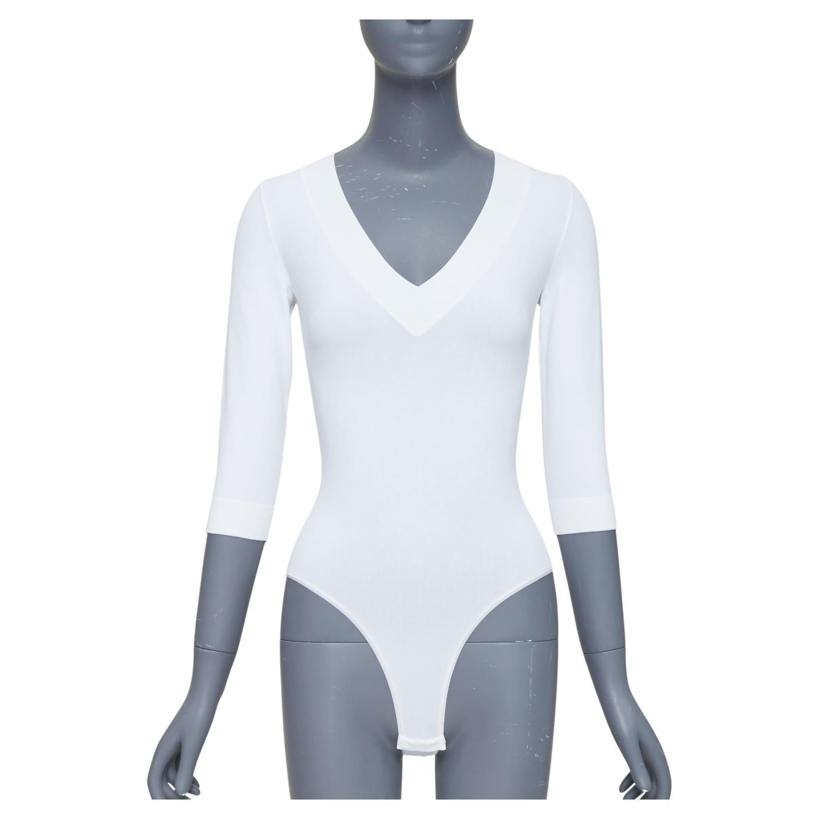 ALAIA top blanco con cuello en pico y mangas 3/4 en mezcla de viscosa FR36 S