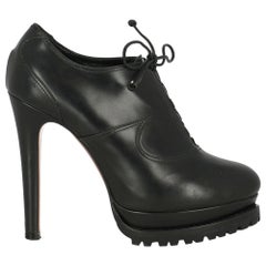 Alaia Woman Ankle boots Black Leather IT 39