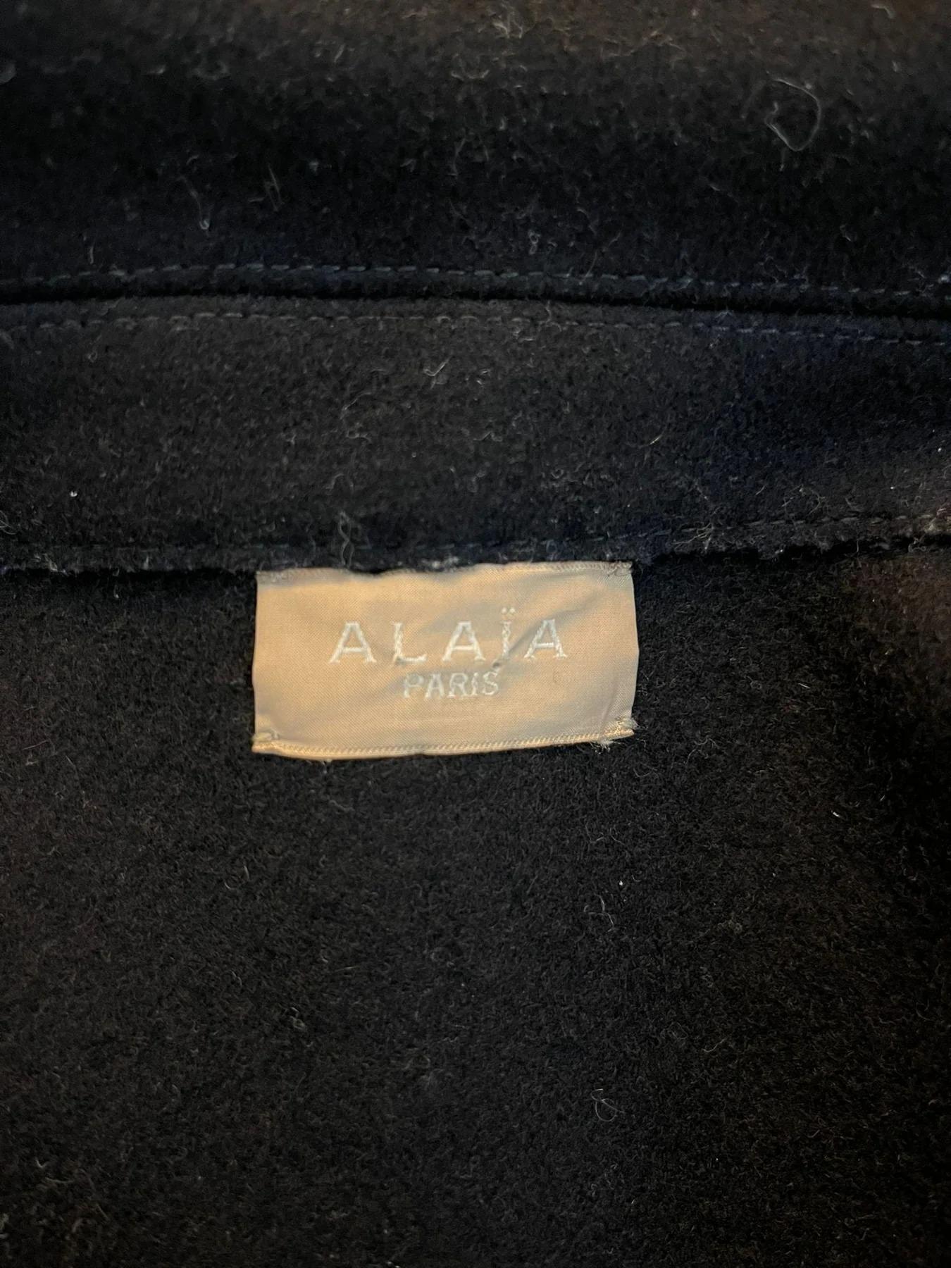 Alaia Manteau en laine avec garniture en cuir Pour femmes en vente