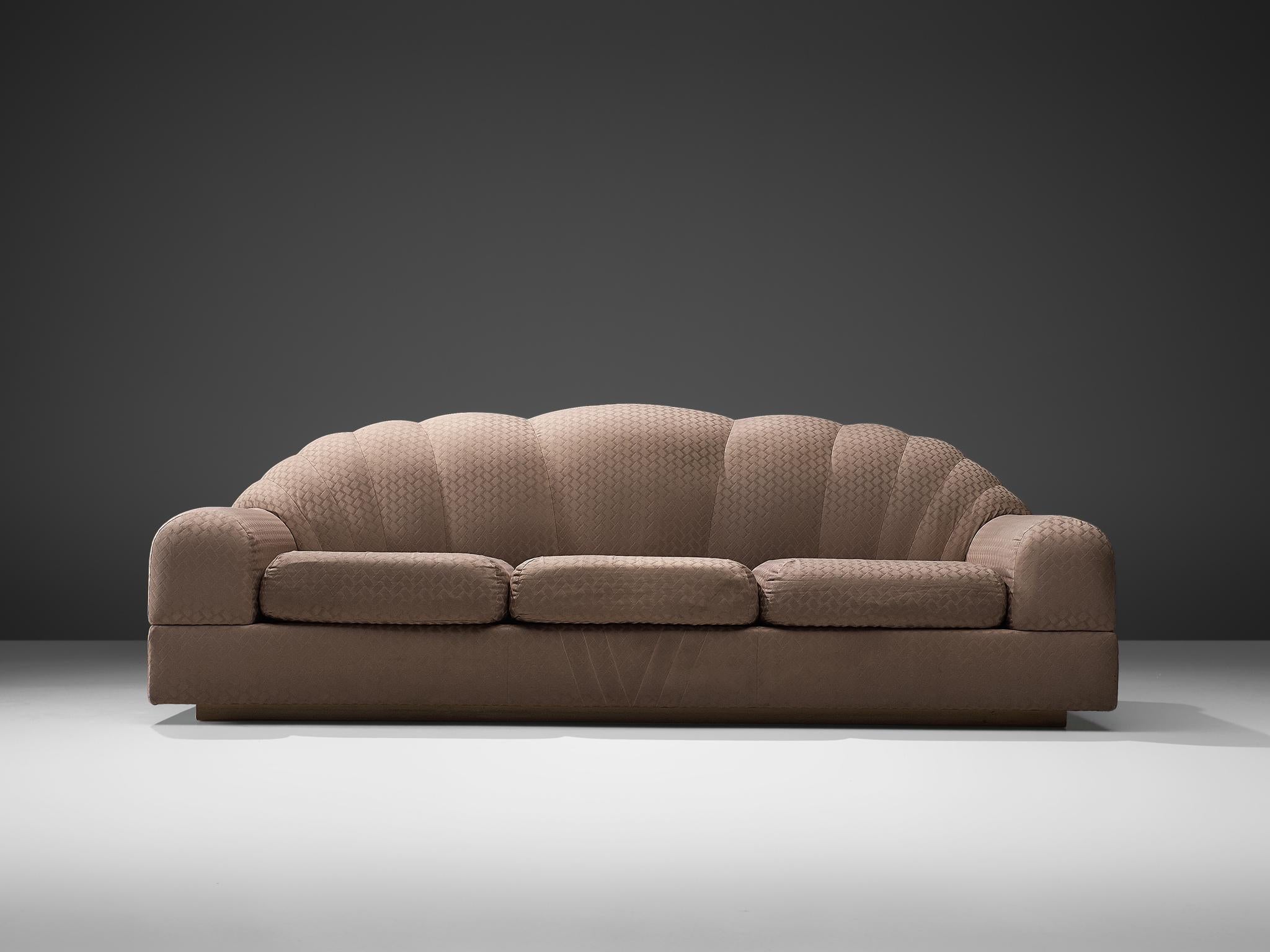 Alain Delon for Maison Jansen, sofa, fabric, France, 1970s

This ornate, grand comfortable three-seat sofa has a strong and playful design. The high, webbed back gives perfect support for the sitter. The thick seat with removable cushion creates a
