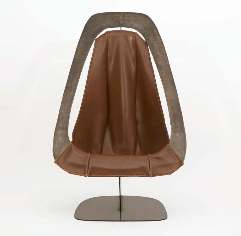 Leather and metal chair by Alain Douillard, circa 1970.
This beautiful piece is a great exemple of French metal sculptor Alain Douillard's work. The chair is in good original condition and was acquired directly from the artist.
 