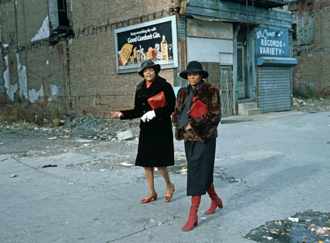 Sunday Morning by Alain Le Garsmeur
Two Churchgoers walk through the streets of Harlem, New York City, USA, April 1978.

Paper size 20 x 24 inches / 50 x 60 cm
Printed in 2022 - produced from the original transparency
Archival Pigment Print and