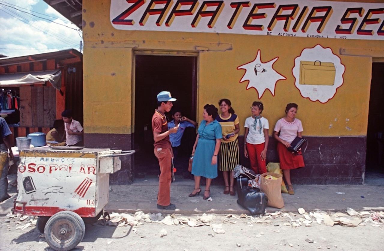 Isletas Ice by Alain Le Garsmeur
People wait by an ice cream cart in Isletas near Isletas banana plantation, Honduras, Central America, 1981.

Paper size 20 x 24 inches / 50 x 60 cm
Printed in 2022 - produced from the original transparency
Archival