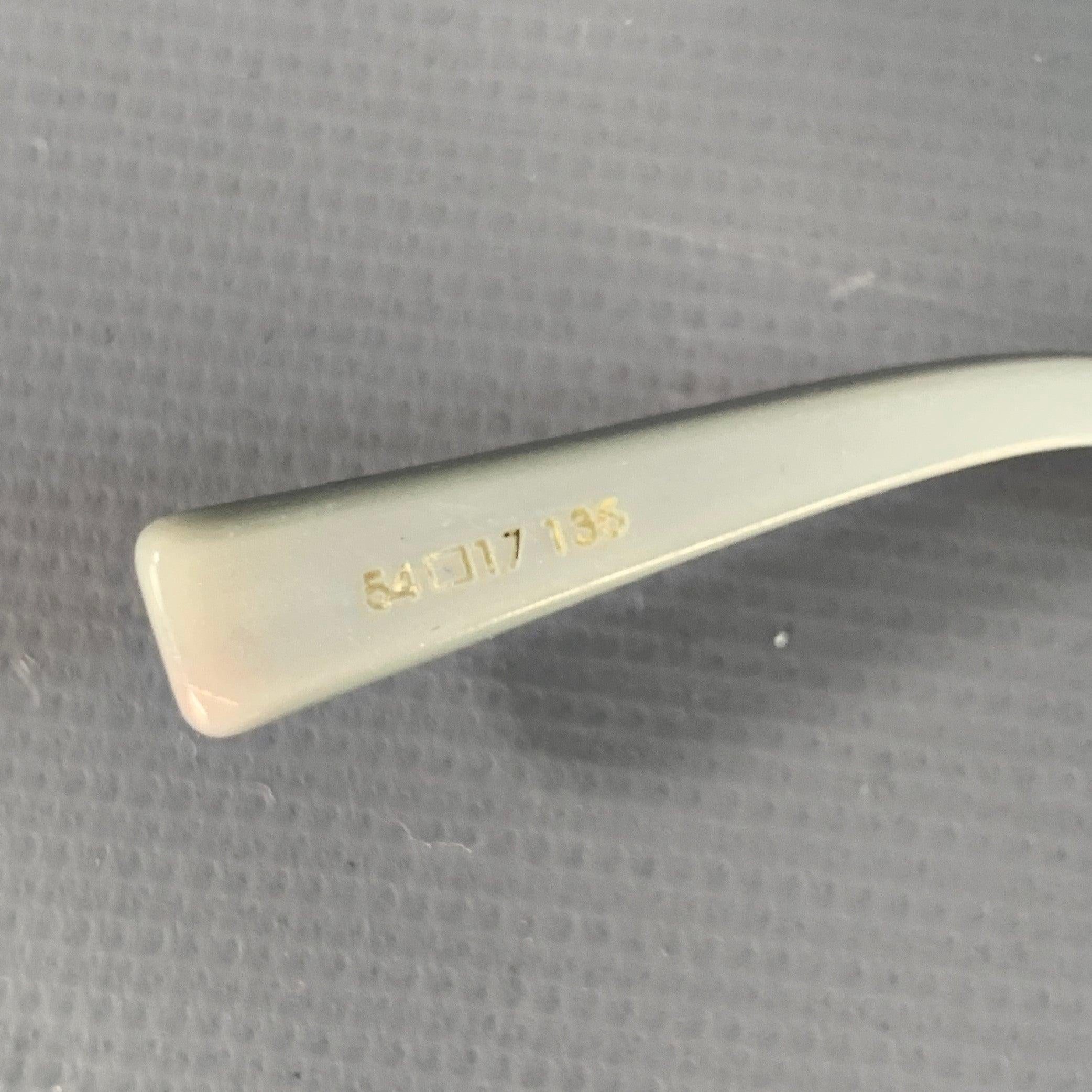 ALAIN MIKLI Lentes de lectura de acetato metálico plateado en venta 1