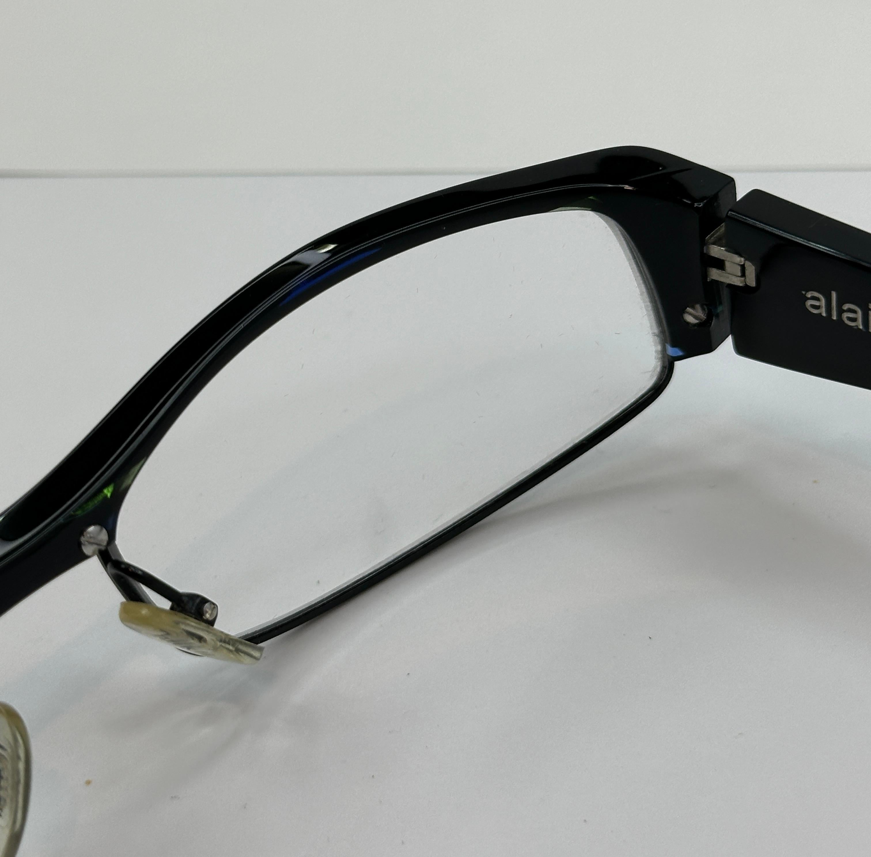 Alain Mikli Thick Black Accented with Clear Green Stripes Prescription Frames 1