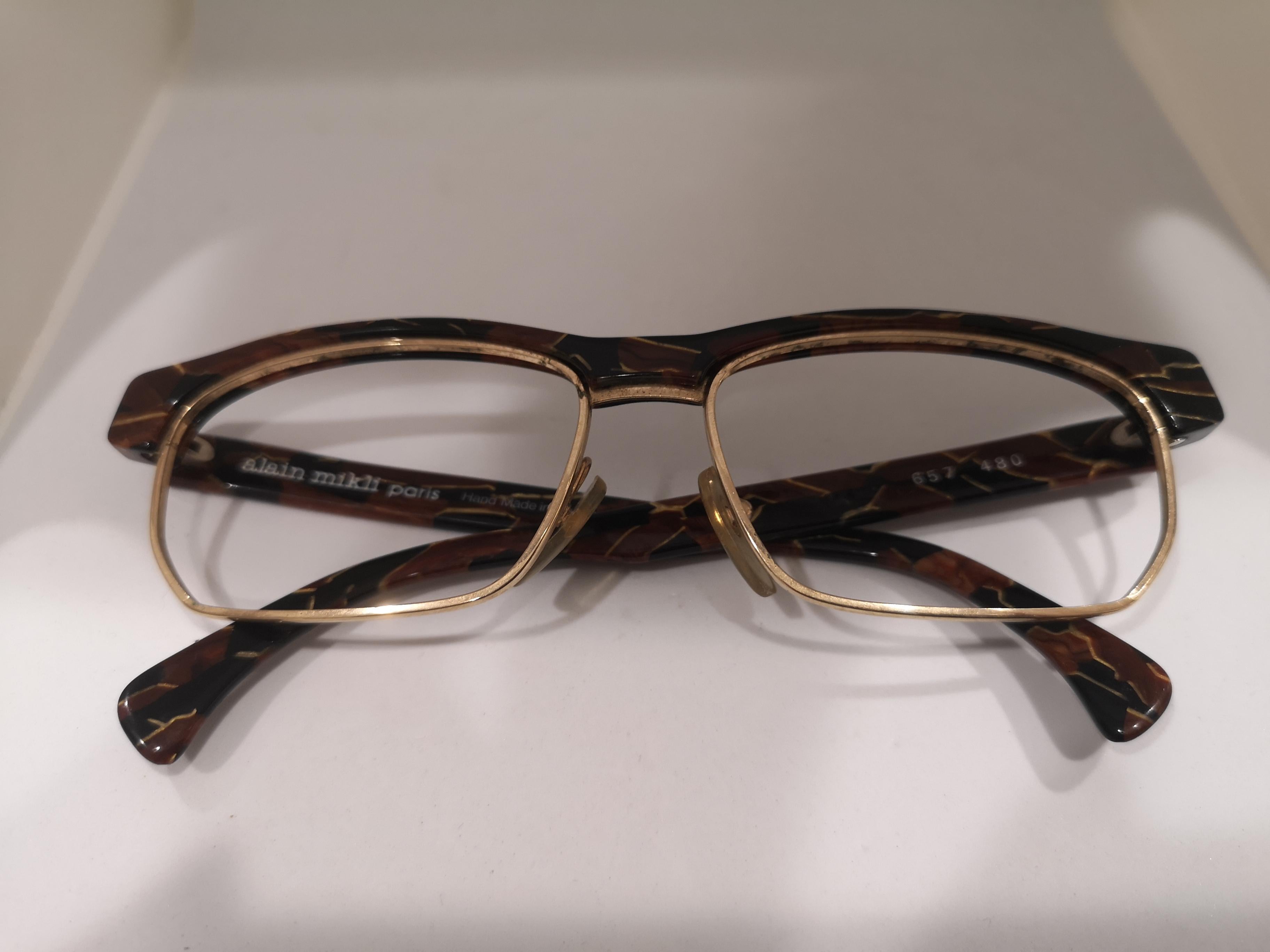 Alain Mikli tortoise gold frames
no glasses