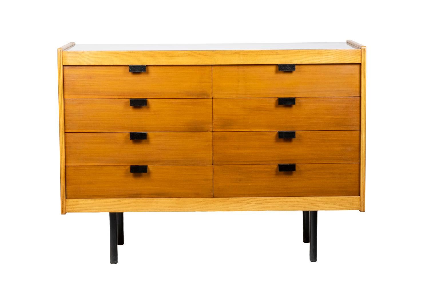 Alain Richard, attributed to. 
Charron Groupe 4, edited by. 

Chest of drawers in ash and mahogany opening with eight drawers in front. Tray in black color. Base and rectangular handles in black lacquered metal.

French work realized in 1954.