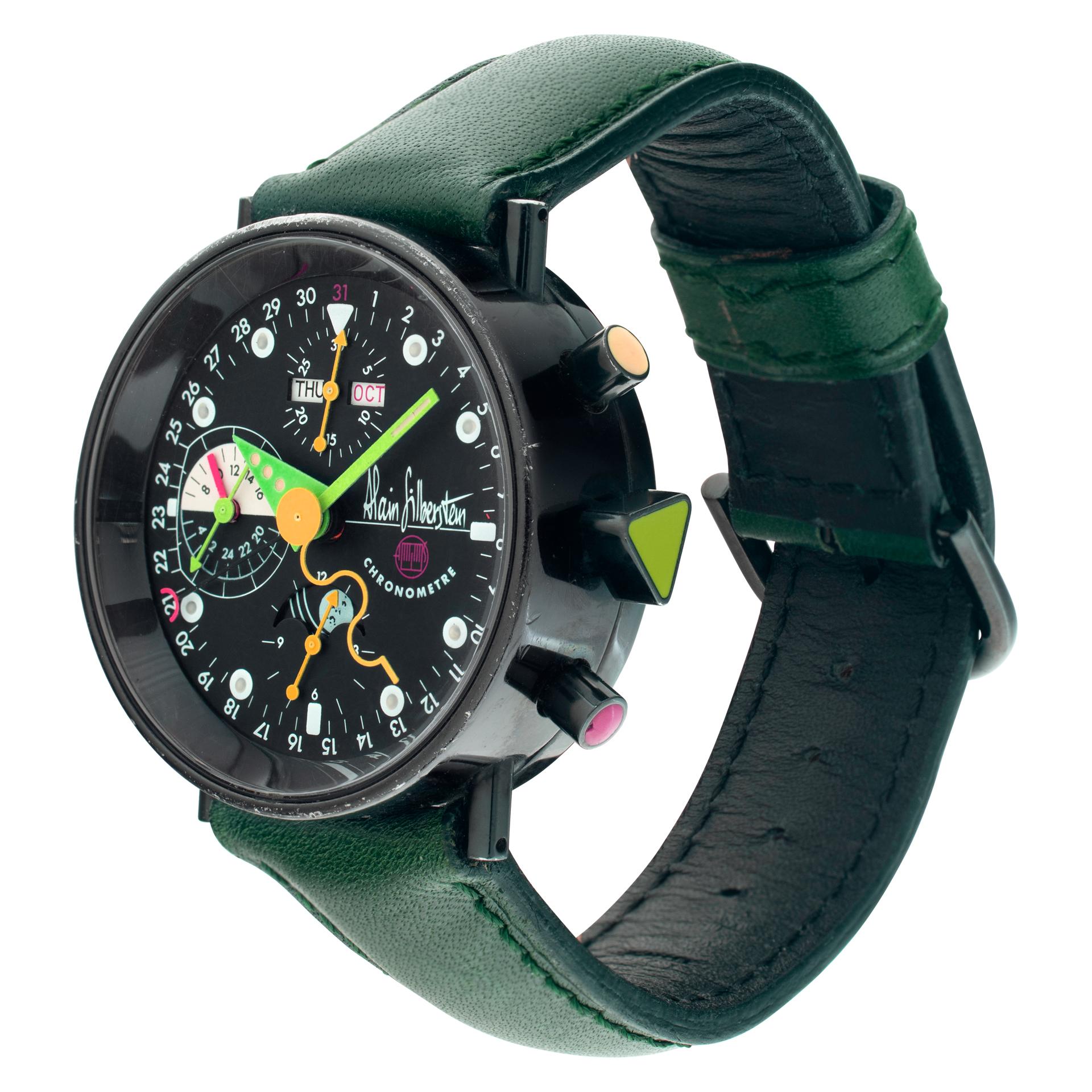 Alain Silberstein Krono 2 in Black PVD stainless steel on a green leather strap. Limited Edition of 999 pieces. Automatic movement under glass w/ date, day, month, chronograph and moonphase. 38 mm case size. With box and papers. Also comes with