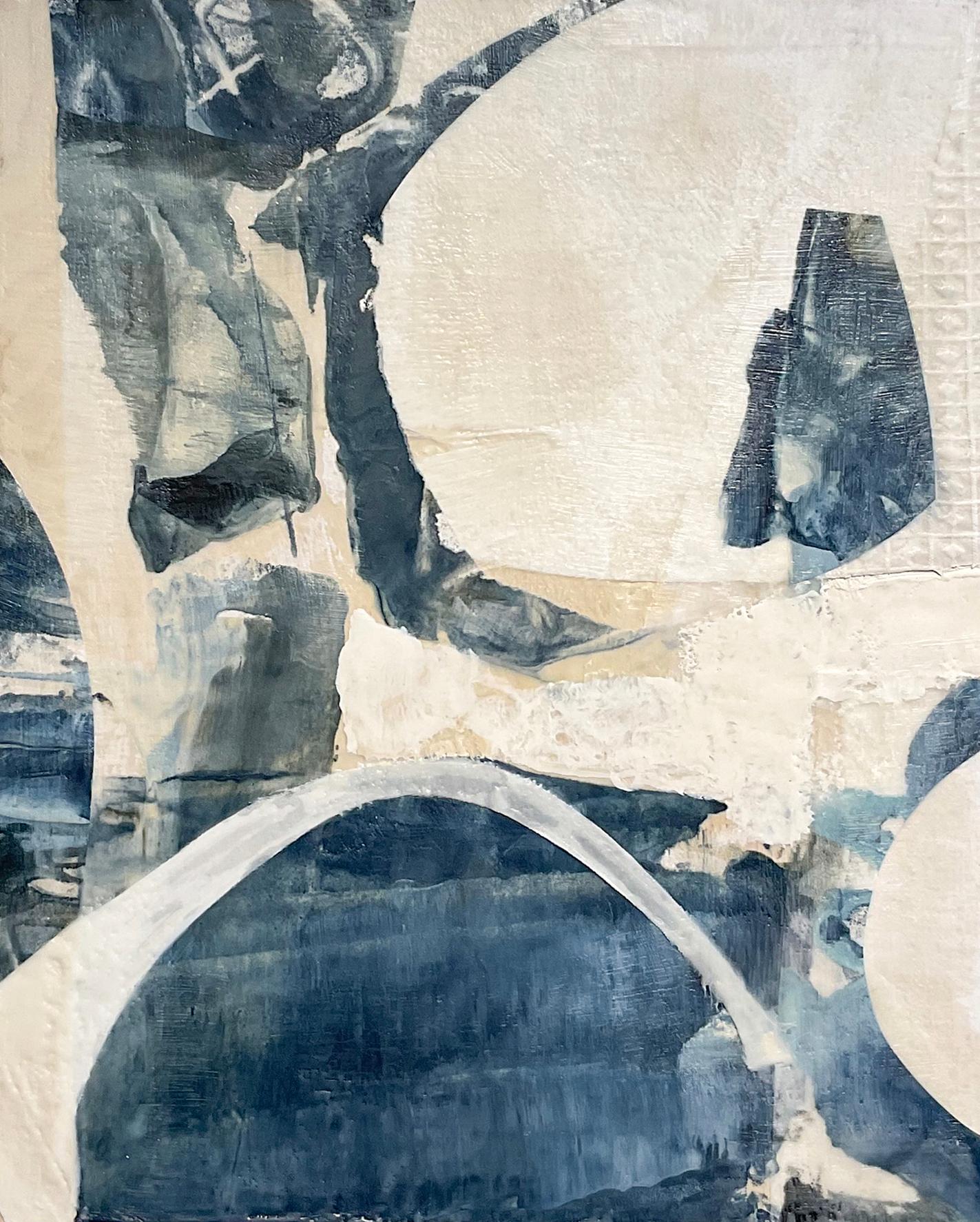 Abstract encaustic painting with dyed teal, indigo, white and beige fabrics 
