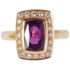 Bague Alamandite en or rose 18 carats sertie d'un grenat et de diamants