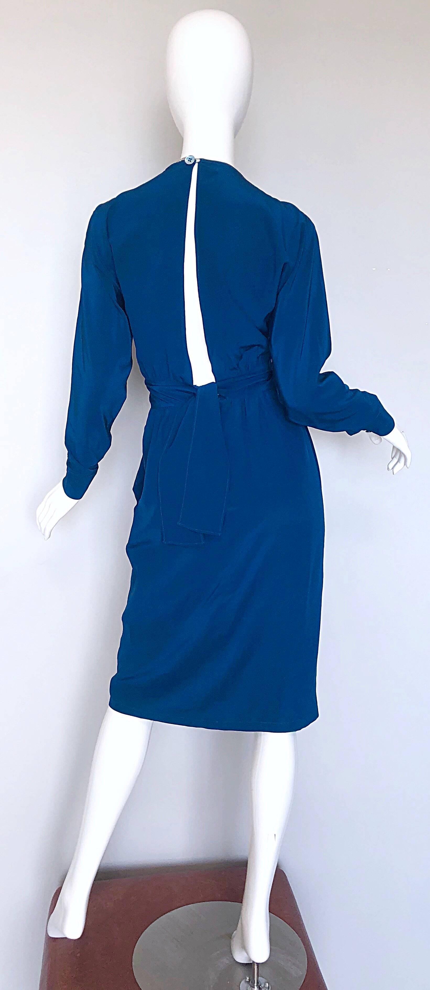 Sophisticated, yet sexy 70s ALAN AUSTIN cerulean blue long sleeve open-back long sleeve silk dress! Words cannot even begin to describe how utterly flattering this dress is! Slight dolman sleeves make this easily accessible to an array of bust