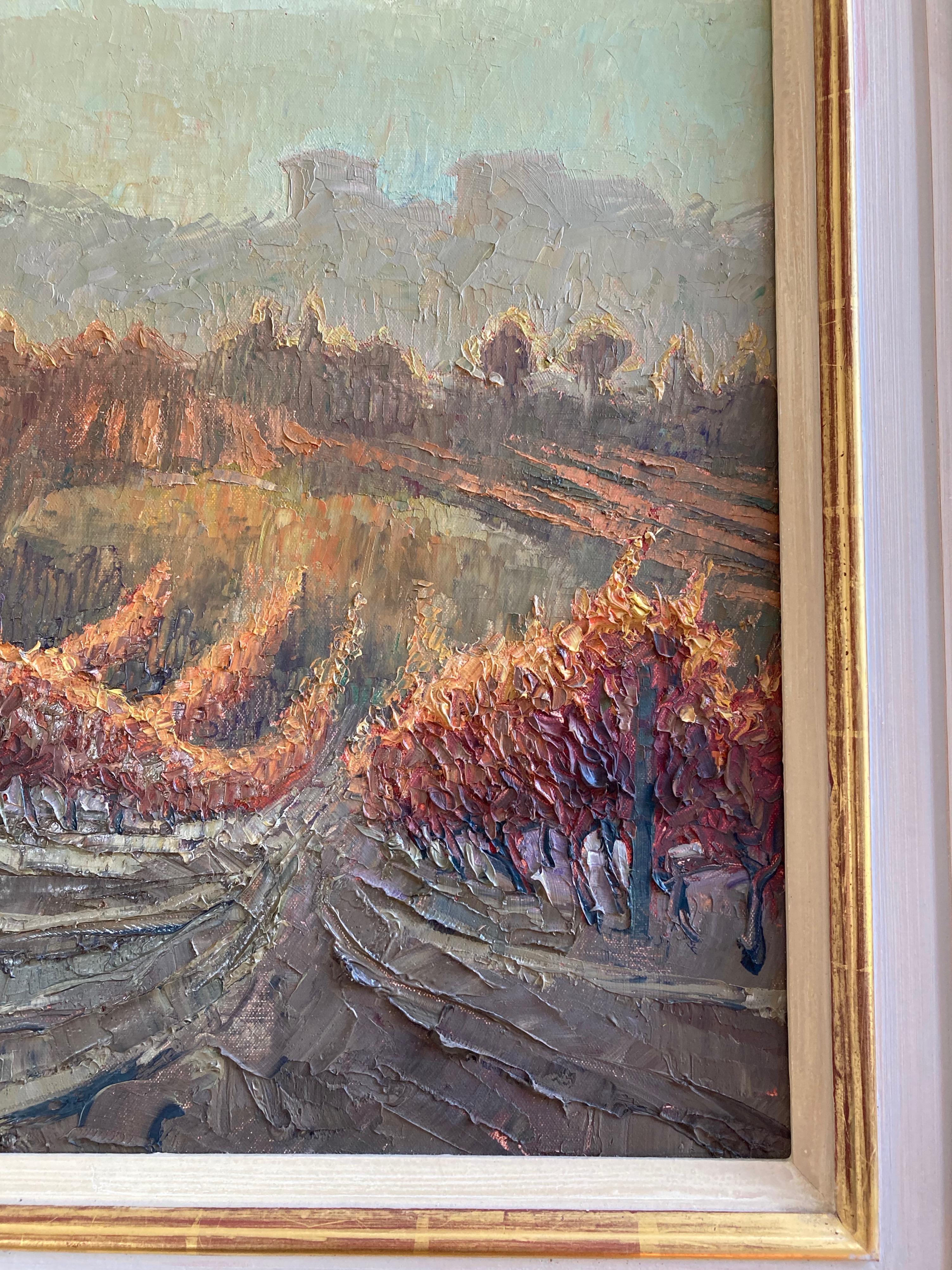 A wonderful view of an Italian vineyard in the Piedmont (or Piemonte) region in North West Italy. The scene is painted with wonderful impasto, the fiery palette sculpted with a palette knife to give fabulous texture. A really striking piece that