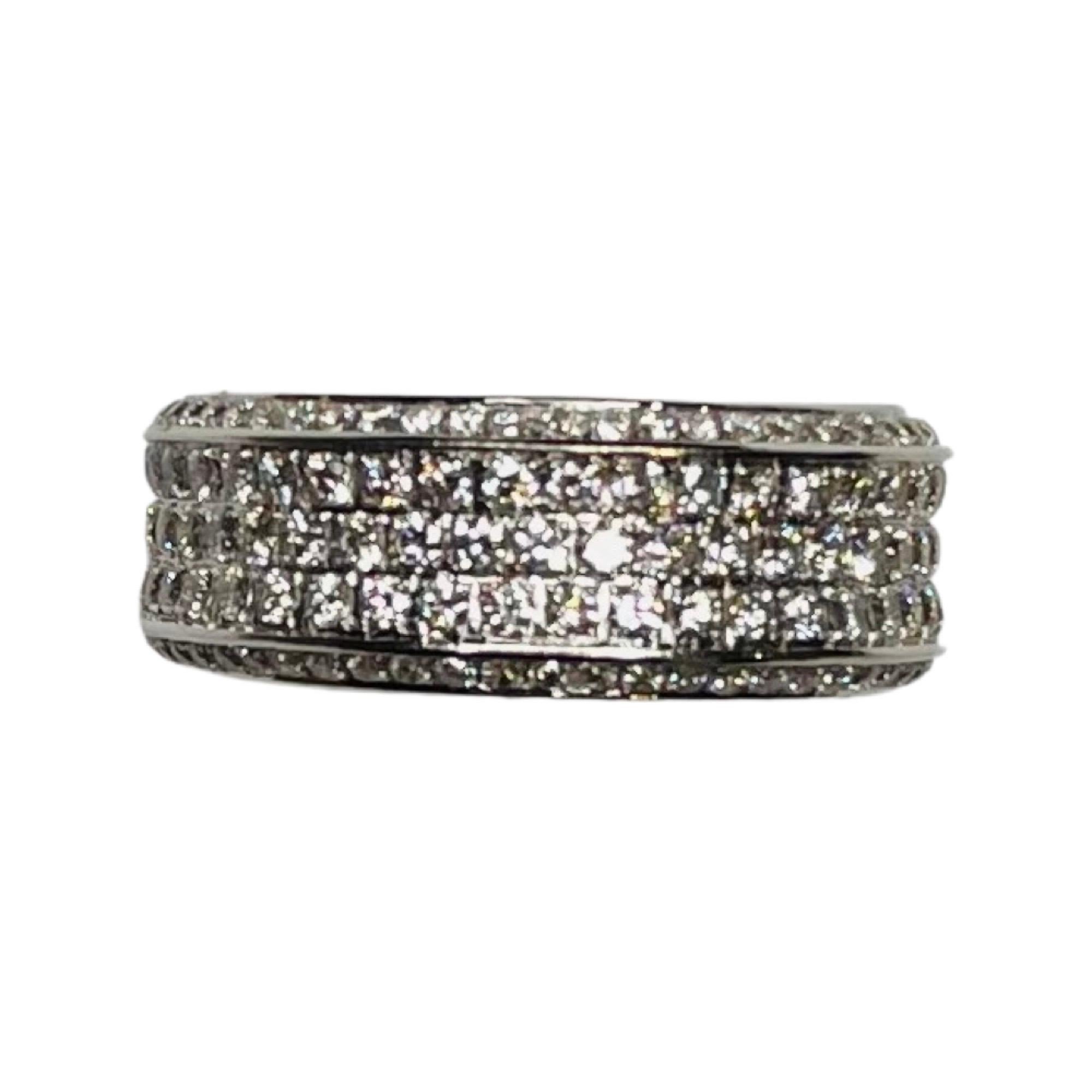Alan Friedman 18K White Gold and Diamond Eternity Band. There are 231 full cut round brilliant diamonds of VS clarity and G color. There is a total diamond weight of 2.71 carats. These diamonds are pave set in 5 rows, three in the center and the