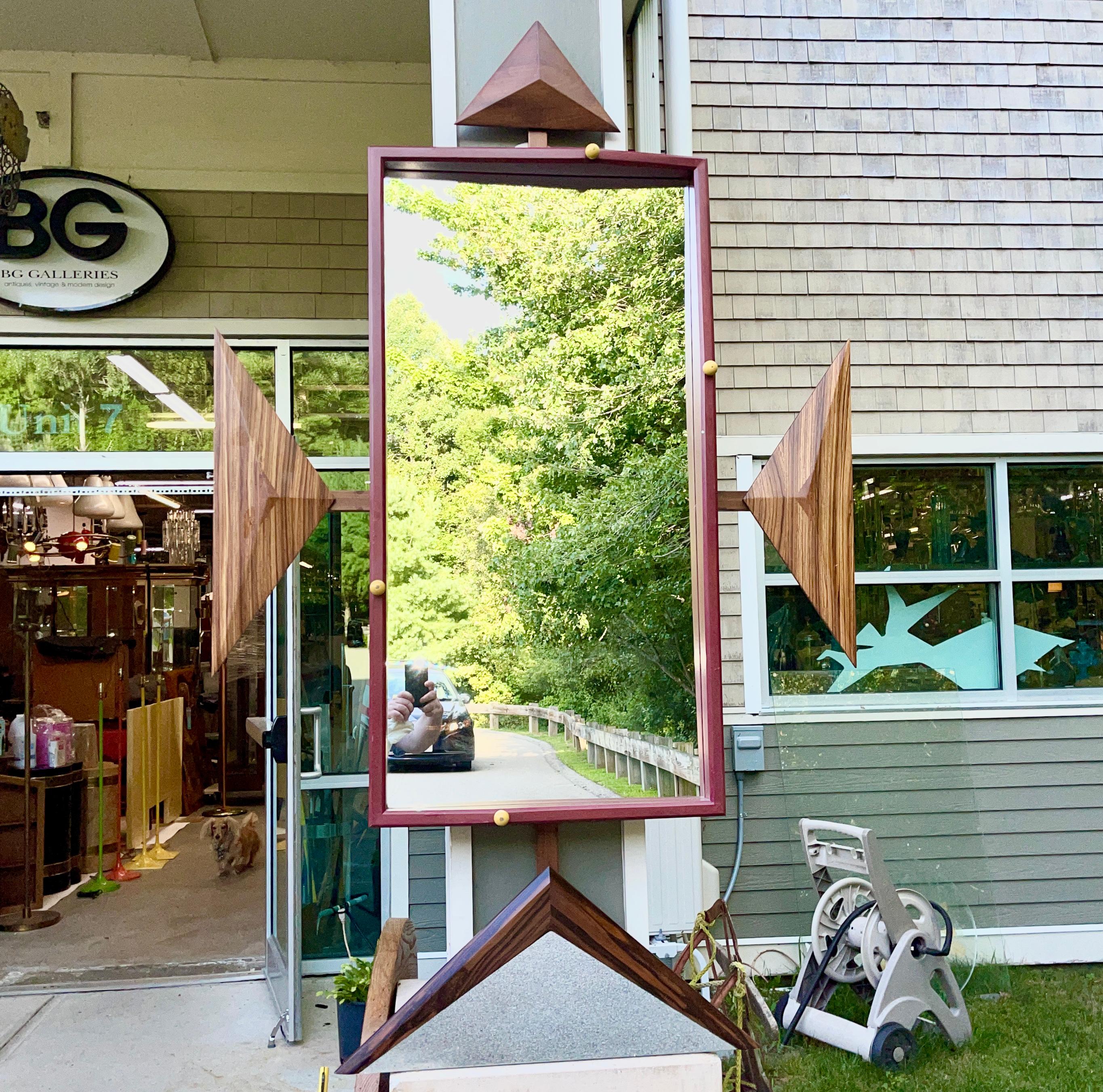 Custom woodwork decorative wall mirror created by artist Alan S. Kushner of Philadelphia circa 1990.
Signed 