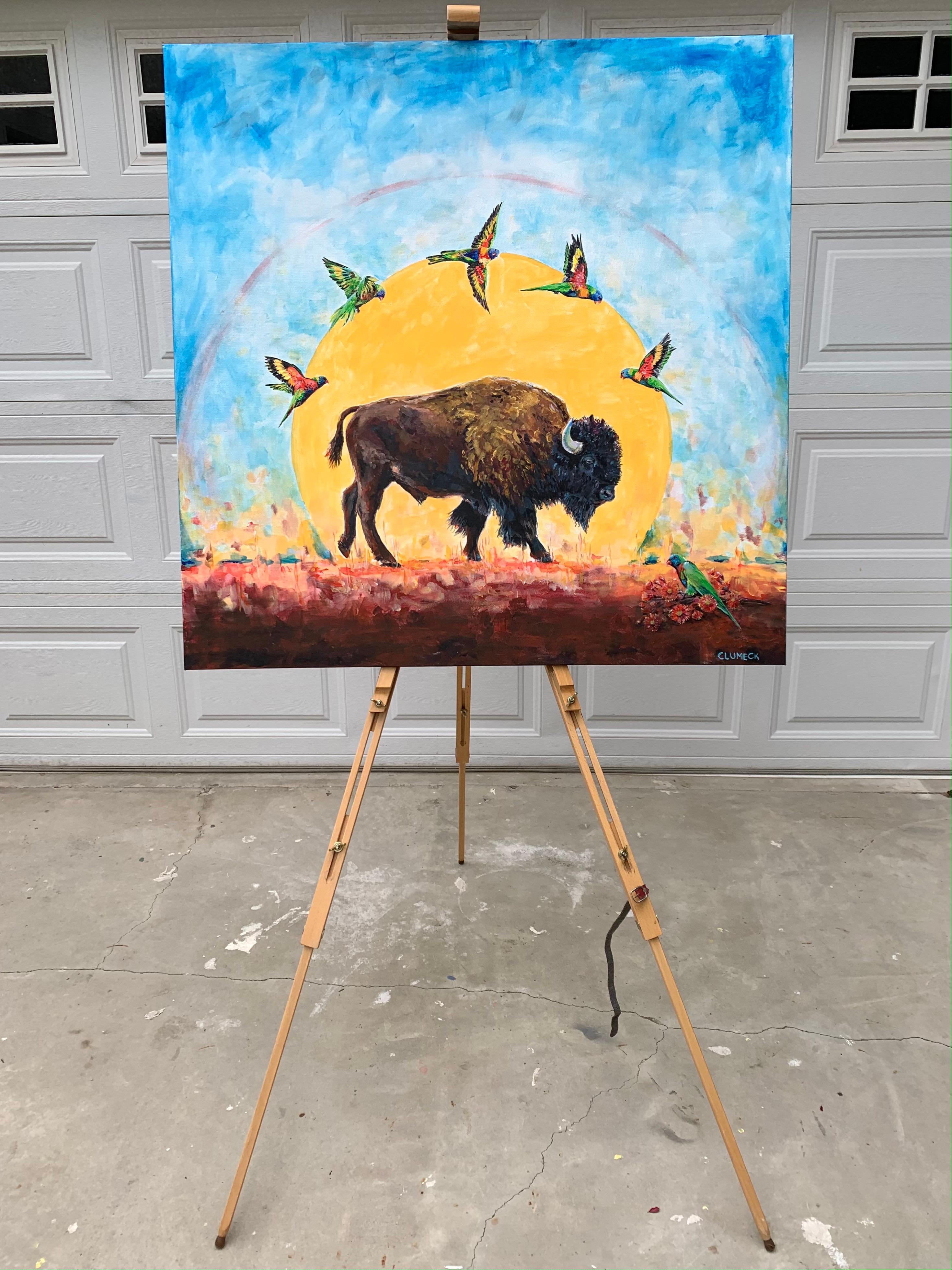 <p>Kommentare des Künstlers<br>Die Künstlerin Alana Clumeck zeigt ein zeitgenössisches Bild eines kräftigen Bisons, der im Mittelpunkt eines strahlenden Sonnenaufgangs steht. Sie lässt sich von einem Besuch in ihrem Heimatland Australien