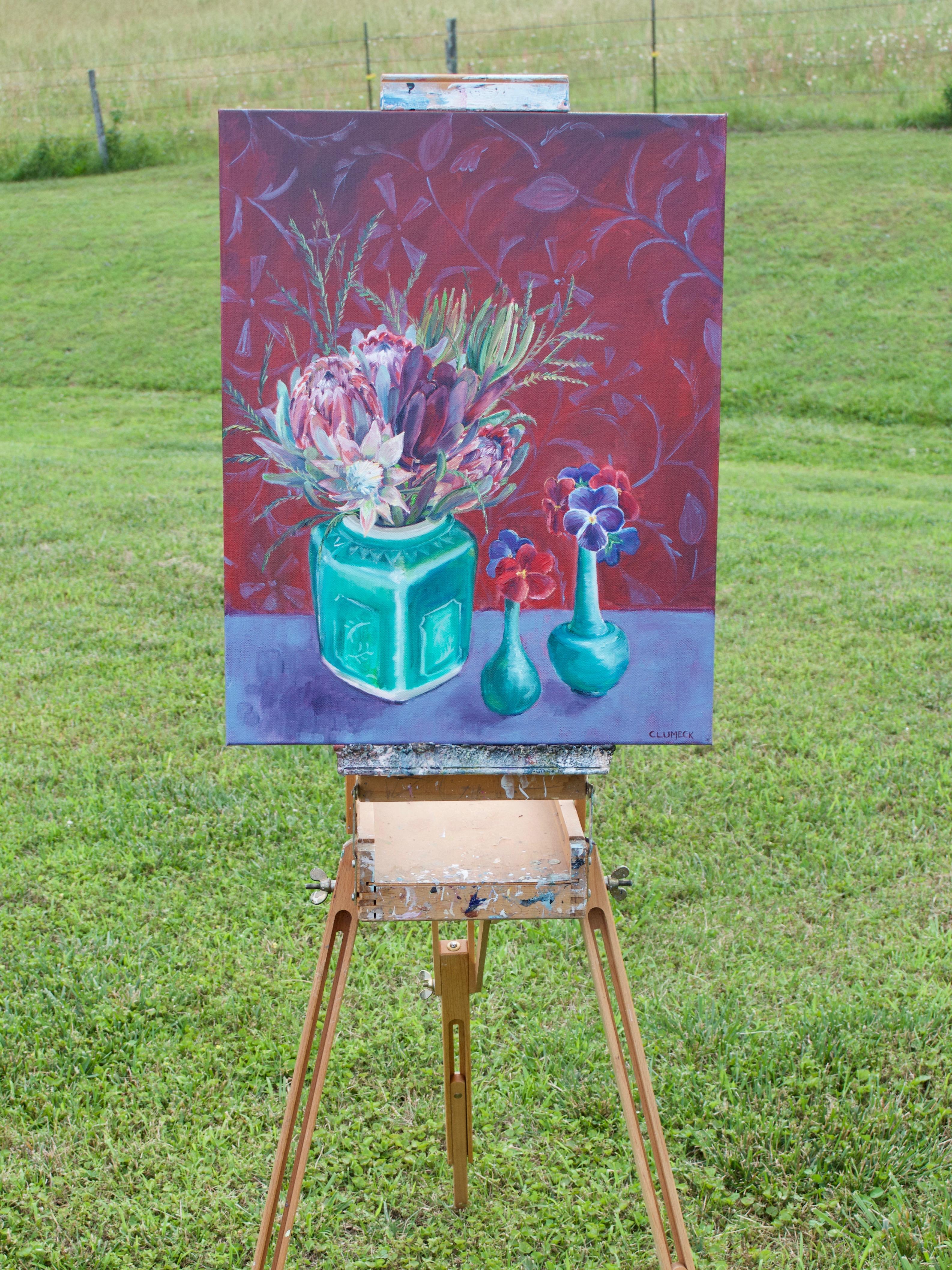 <p>Artist Comments<br>A vibrant still life depicts proteas bursting from a square vase and pansies blooming from two slender vases. Through the delicate interplay of pottery, flowers, and pattern, this piece captures the serenity of stillness. It