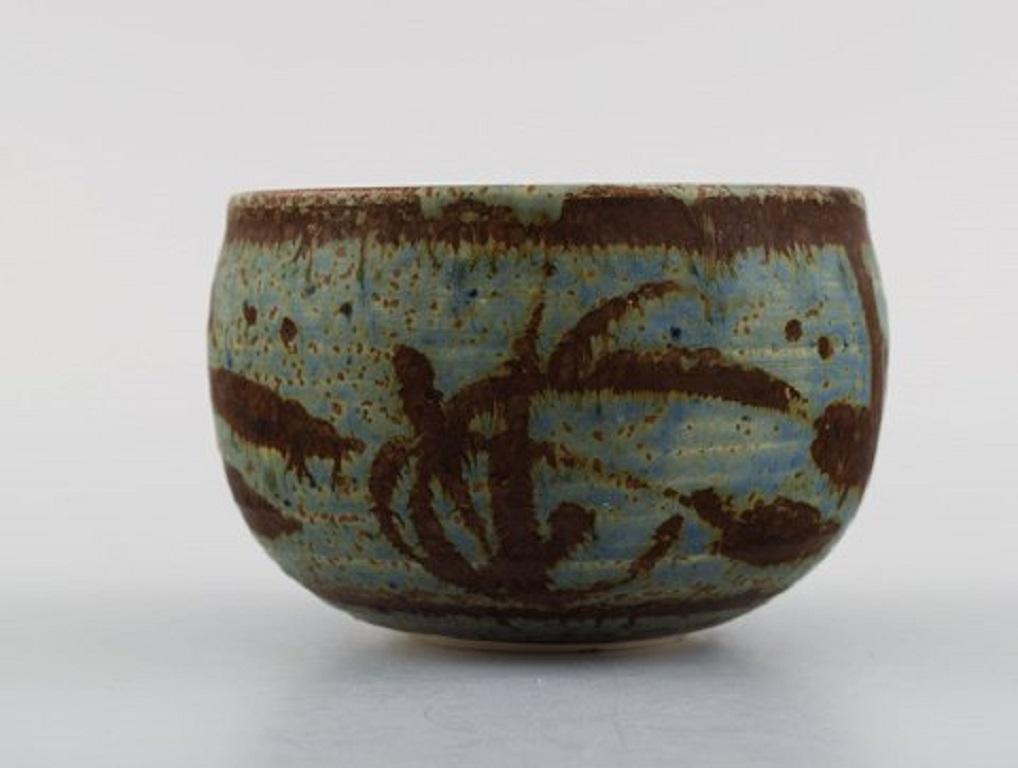Åland, contemporary ceramicist. Bowl in glazed stoneware. Beautiful glaze in brown and blue-green shades. Late 20th century.
Measures: 11 x 7 cm.
Signed.
In excellent condition.