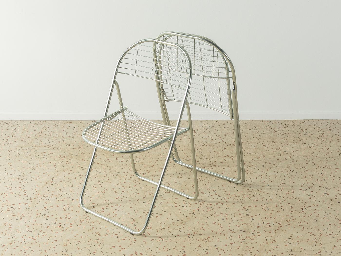Åland metal folding chairs by Niels Gammelgaard for IKEA from the 1970s. The offer includes 2 chairs.

Quality Features:
 good workmanship
 high-quality materials
 Made in Sweden. Design: Niels Gammelgaard, manufacturer: IKEA.