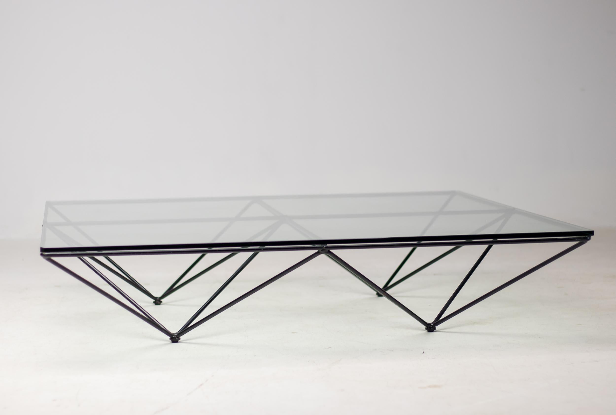 The Paolo Piva Alanda Architectural Coffee Table by B&B Italia is a stunning piece of furniture that combines sleek, modern design with functionality and durability. The table is made of high-quality materials, including a sturdy black enameled