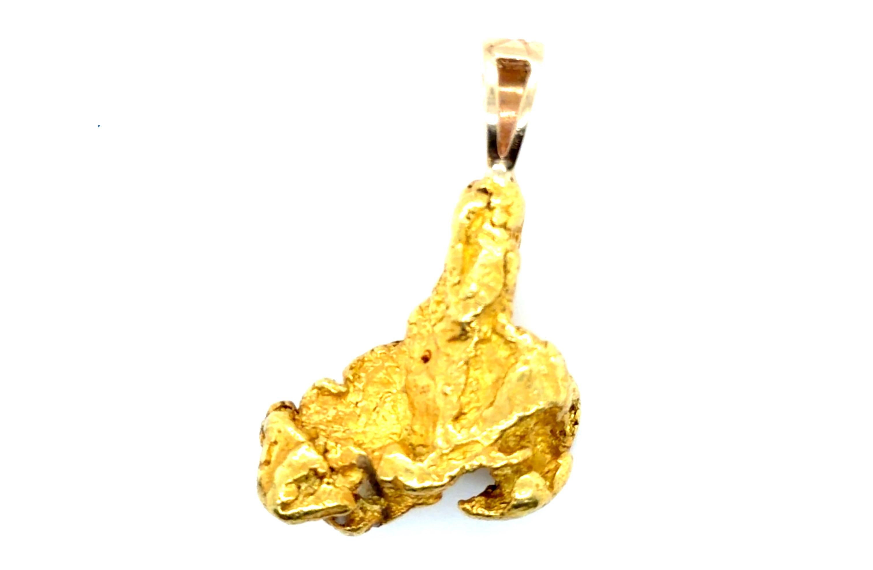 Alaskan Gold Nugget Pendant Necklace Large 20.7 Grams Pure 23-24K Gold



HUGE Genuine Pure Gold Nugget

Weighs 20.7 Grams

That's Over $2,800 in Gold Value Alone

23K-24K Solid Yellow Gold

14K Yellow Gold Bail

Excellent