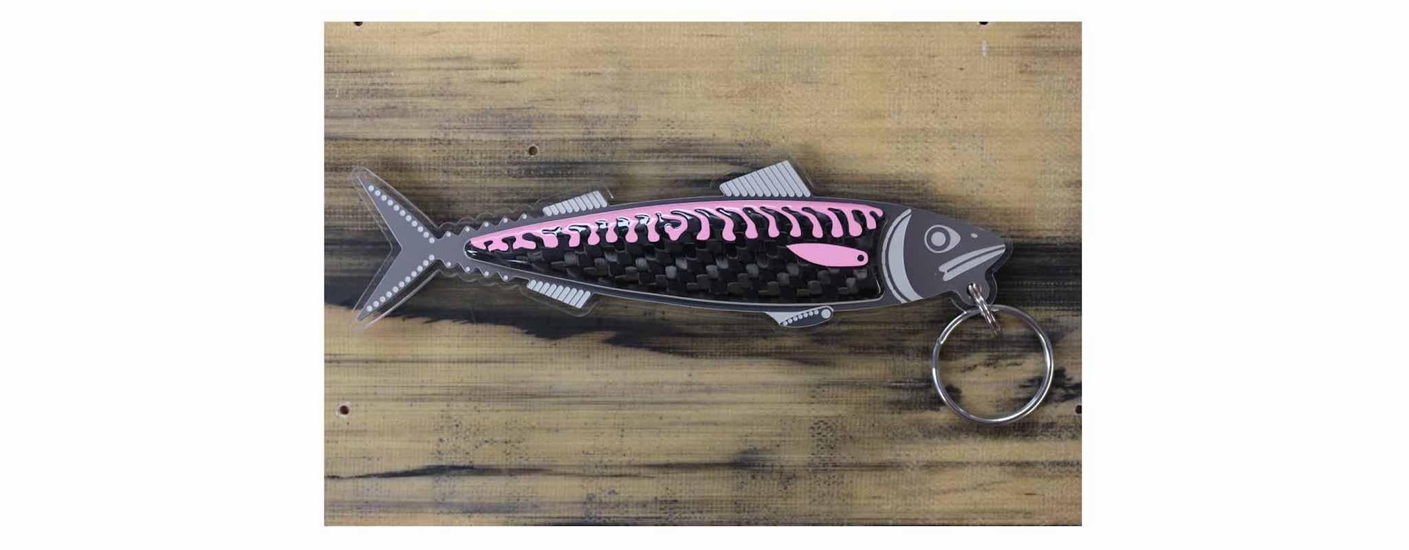 This sculpture shows stylised engineered mackerel / piranha / trout used as a keyring.
Sculpture limited to five hundred pieces per colour option.

Colour options:
• blue
• red
• silver
• white
• yellow
• orange
• fluoro orange
• green
• turquoise
•