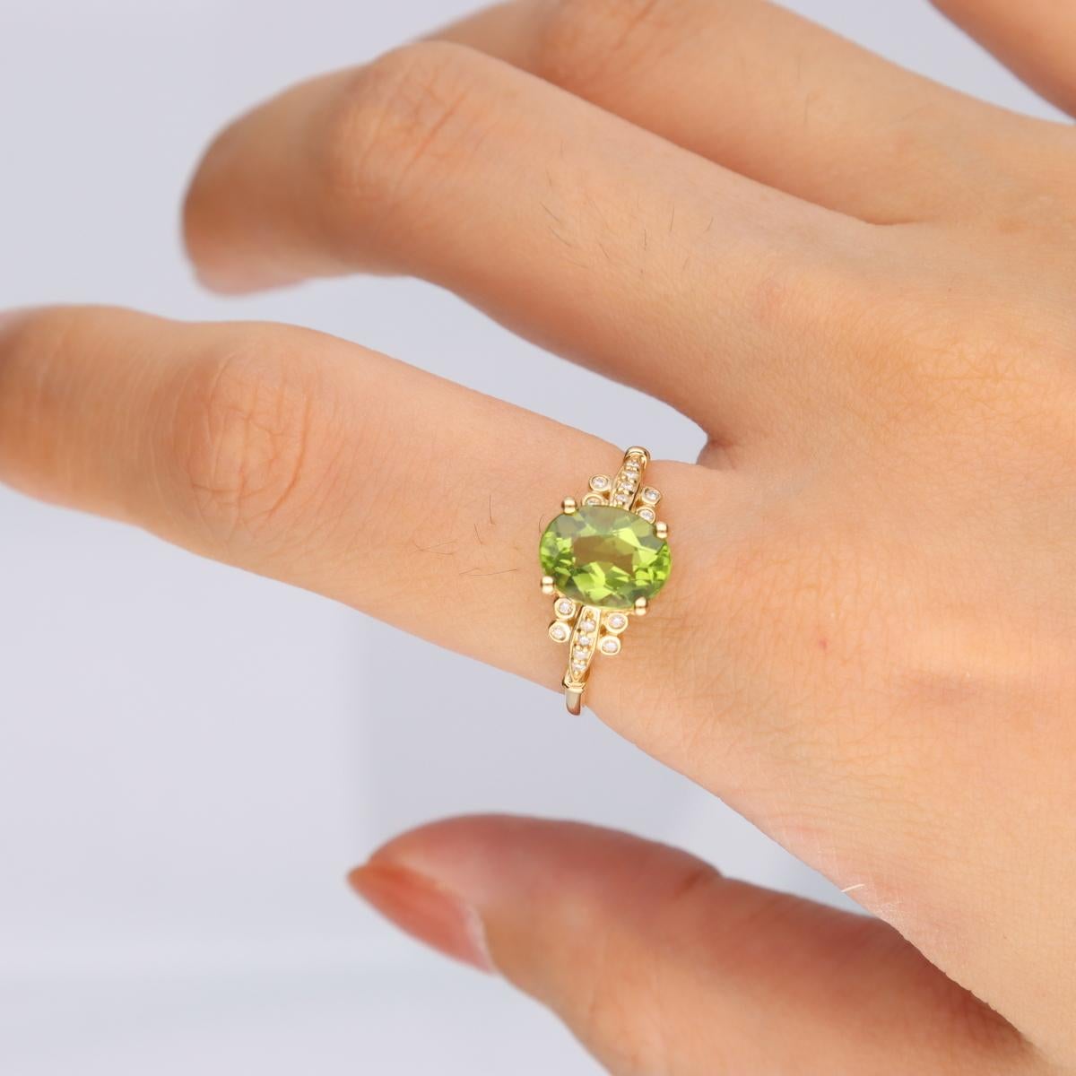 Stunning, timeless and classy eternity Unique ring. Decorate yourself in luxury with this Gin & Grace ring. This ring is made up of 7X9 Oval-Cut Prong Setting Genuine Peridot (1 pcs) 2.0 Carat and Round-Cut Prong Setting Natural Diamond (16 pcs)