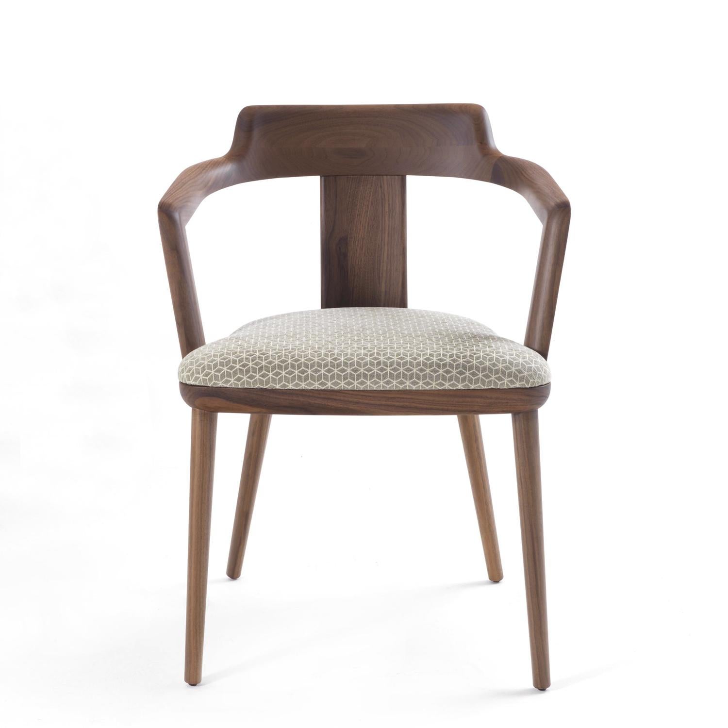 Chair Alba with all structure in solid walnut wood,
seat upholstered and covered with fabric Cat B.
Also available with other fabrics or leathers covering, on request.