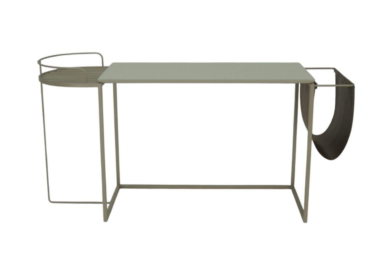 The Alba Console Table with Ecological Leather Pocket is produced with a carbon steel structure with golden automotive paint (the finish can also be customized). The top is in MDF coated with glass, and they are also available with a variety of