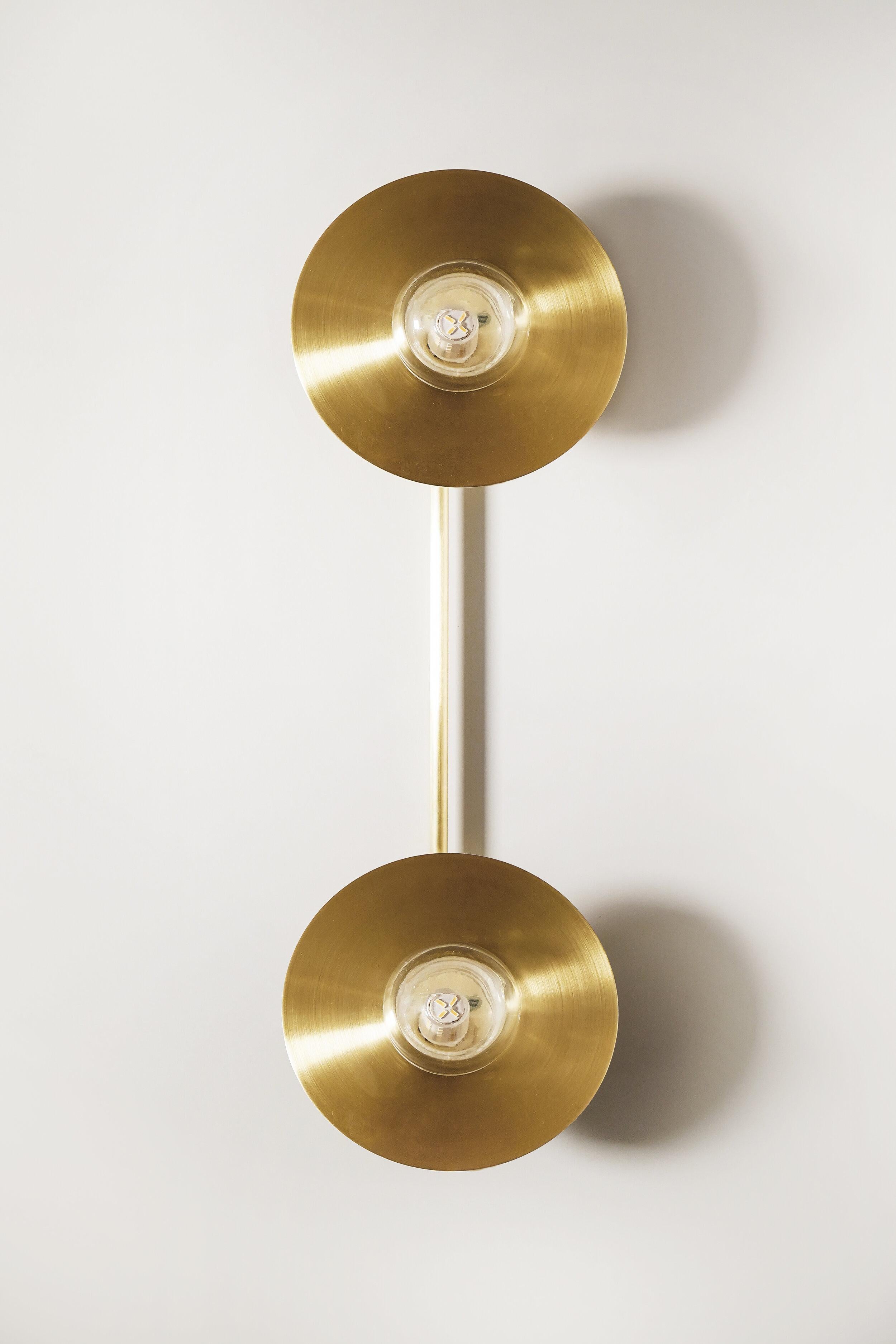 Alba Double Wall Light XL by Contain
Dimensions: D 22 x W 60 x H 11.5 cm 
Materials: brass, 3D printed PLA structure and optical lens.

Also available in different finishes and dimensions (15 cm Ø x 60 cm x 11,5 cm and 22 cm Ø x 60 cm x 11,5