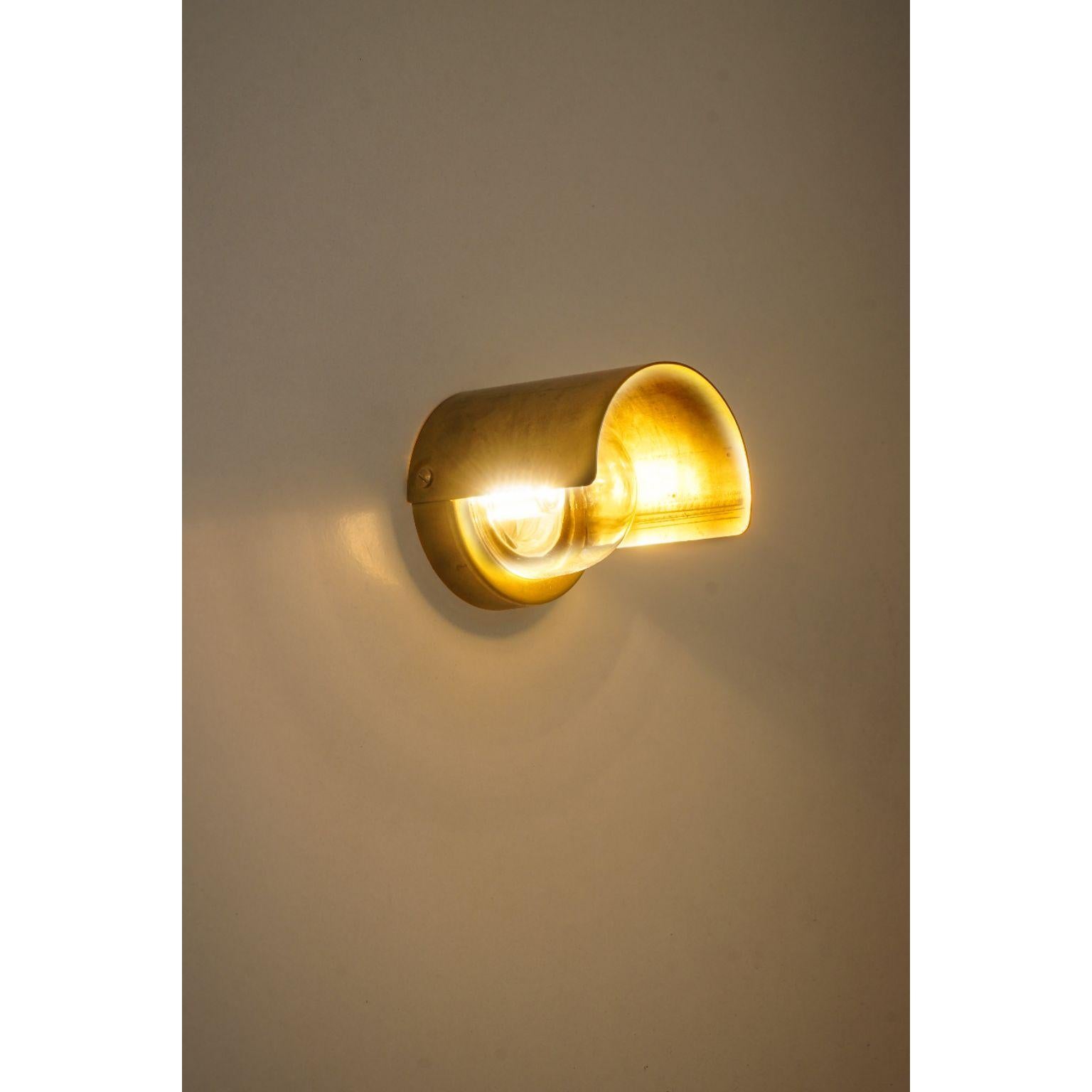 Alba Monocle Exterior Wall Light by Contain
Dimensions: D 8 x W 8 x H 10 cm. 
Materials: Brass, 3D printed PLA structure and optical lens.

Available in different finishes, Universal box required for installation / indoor and outdoor. Please contact