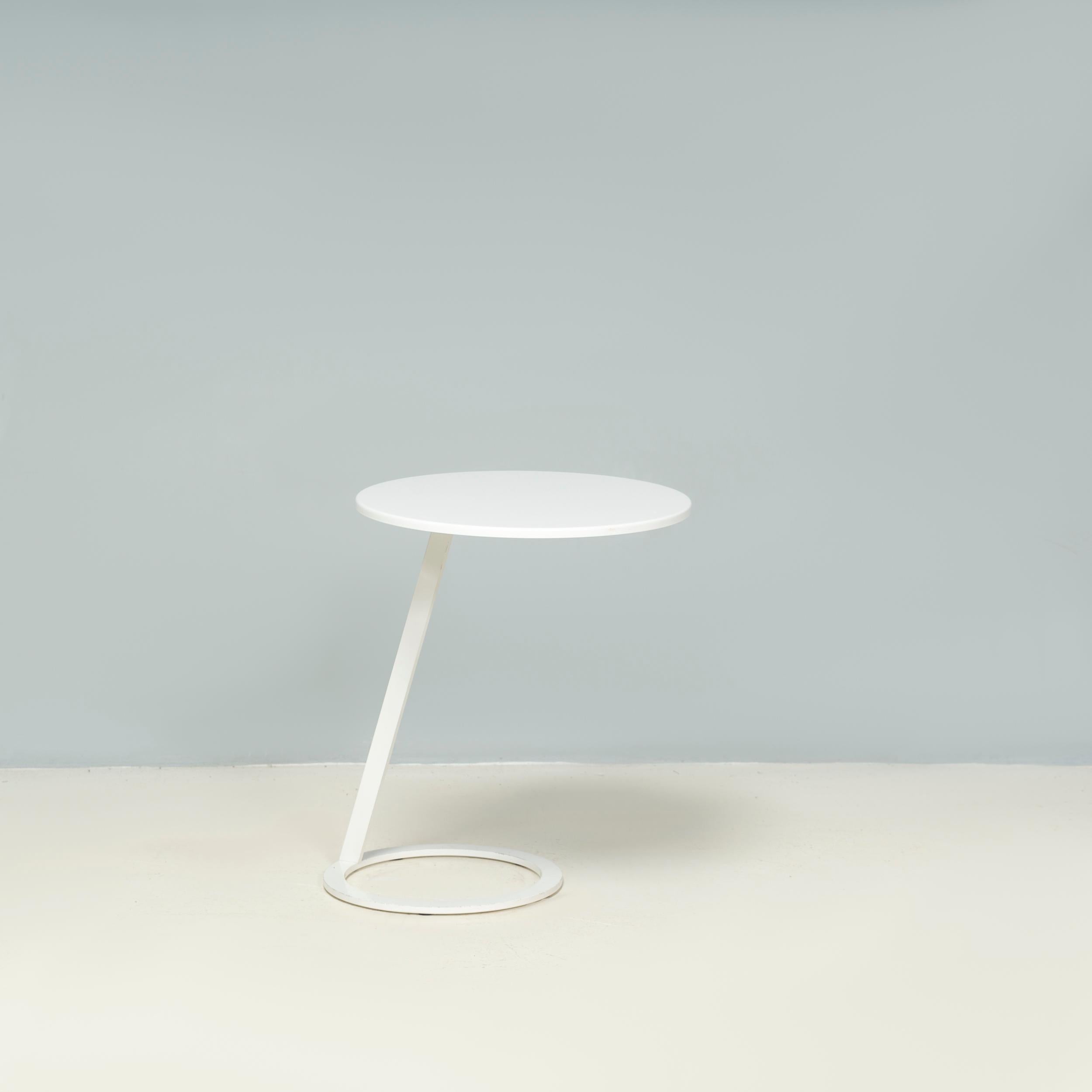 Originally designed by Alban-Sébastien Gilles for Ligne Roset in 2002, the Good Morning side table is a fantastic example of minimalist contemporary design.

Constructed from metal with a white lacquer finish, the pedestal table sits on a circular