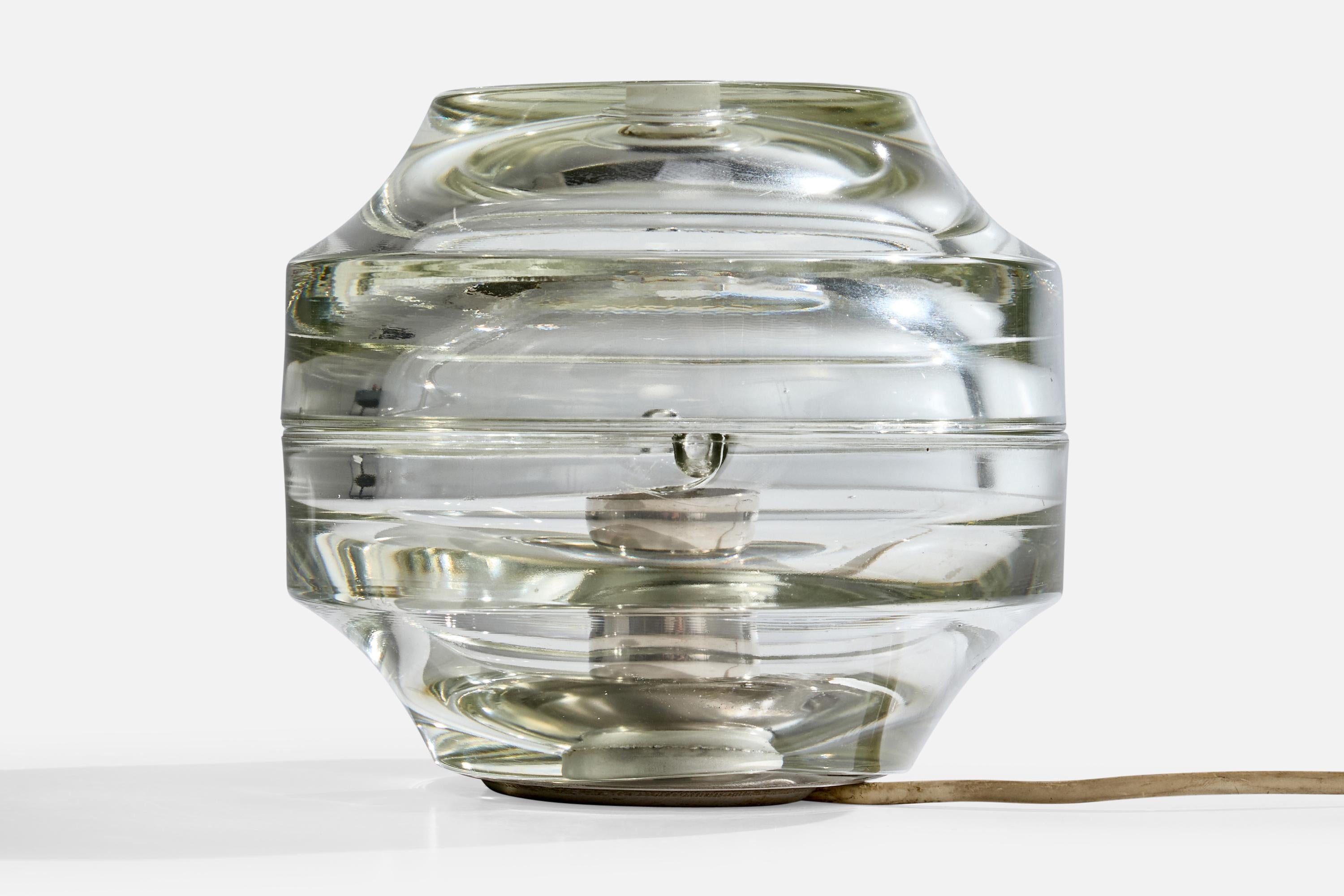 A glass table lamp designed by Albano Poli and produced by Poliarte, Italy, c. 1970s.

Wear consistent with age and use. 

Shallow loss to inside of glass.

Dimensions of Lamp (inches): 7