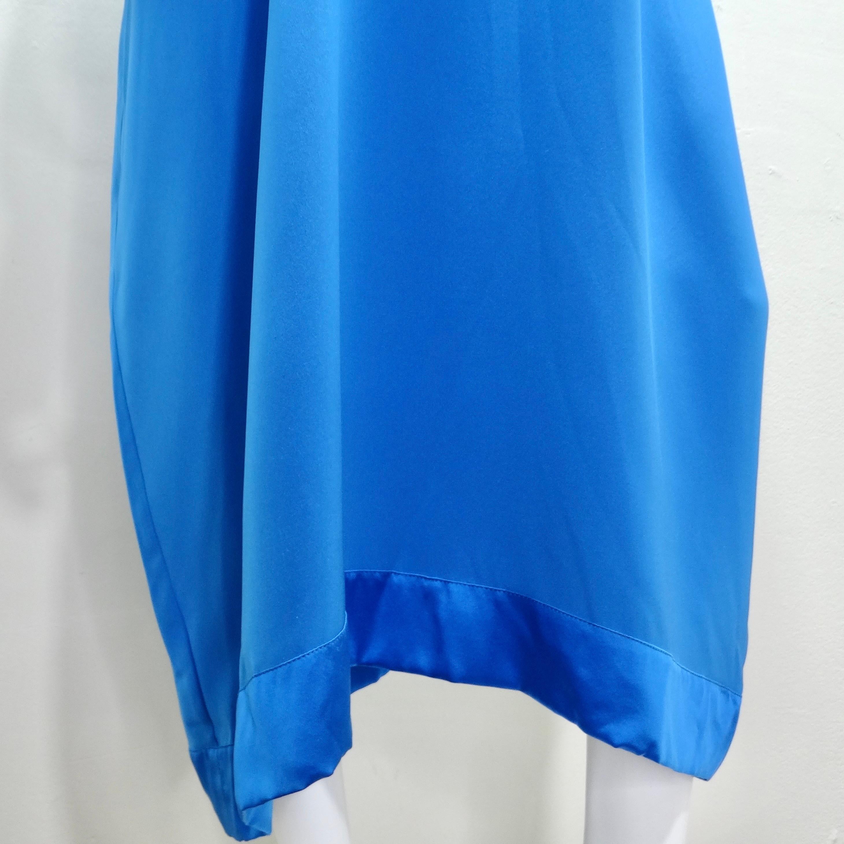 The Albert Capraro 1970s Blue Kaftan Dress sounds like a fabulous vintage piece with its striking cobalt blue color and elegant design.

The kaftan style is known for its loose and flowy silhouette, making it comfortable and breathable to wear. The