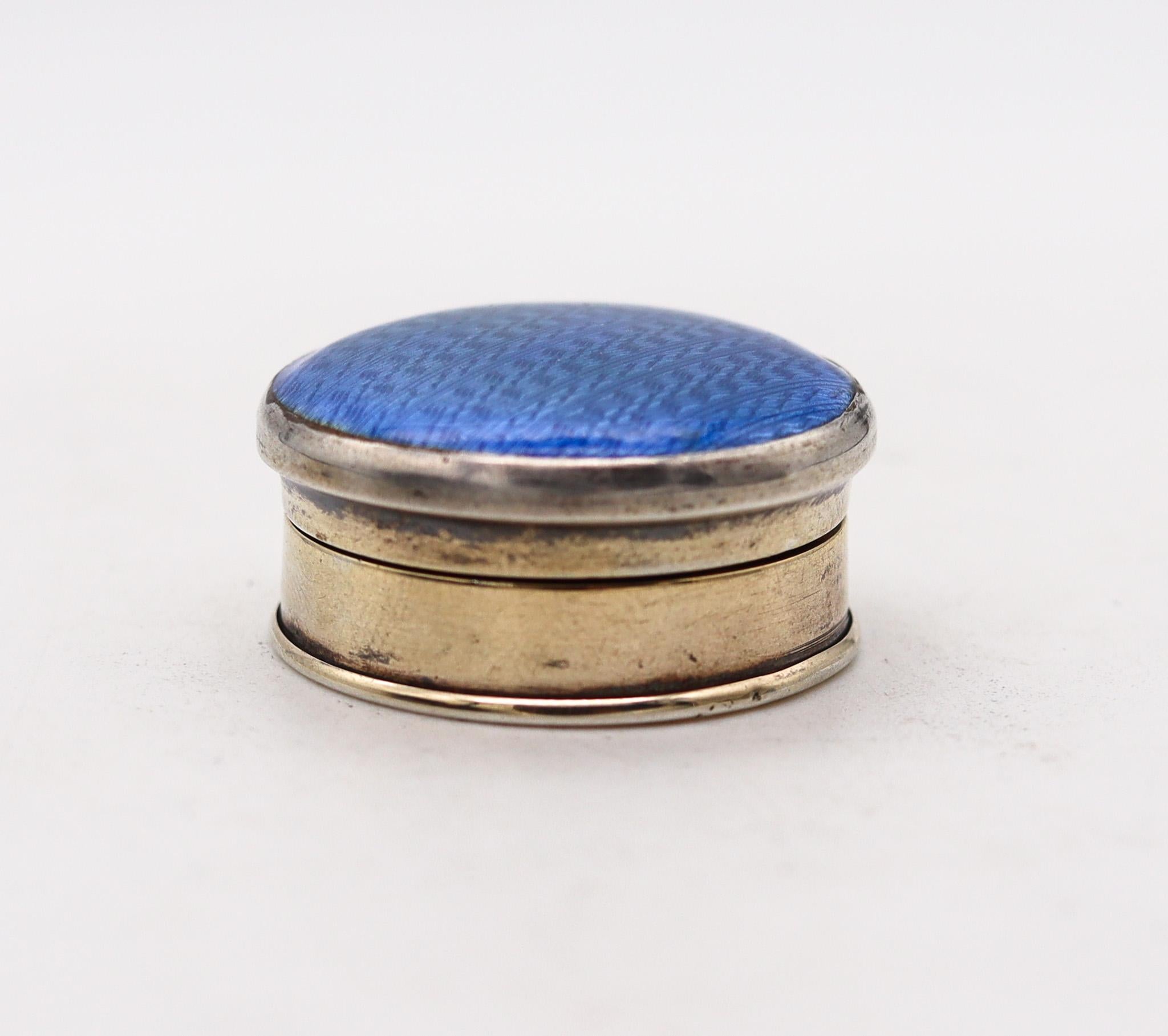 An art deco guilloche enamel pills box made by Albert Carter.

Beautiful enamel round pill box, created in Birmingham England during the art deco period. This beautiful antique piece was carefully made at the workshop of Albert Carter back in the