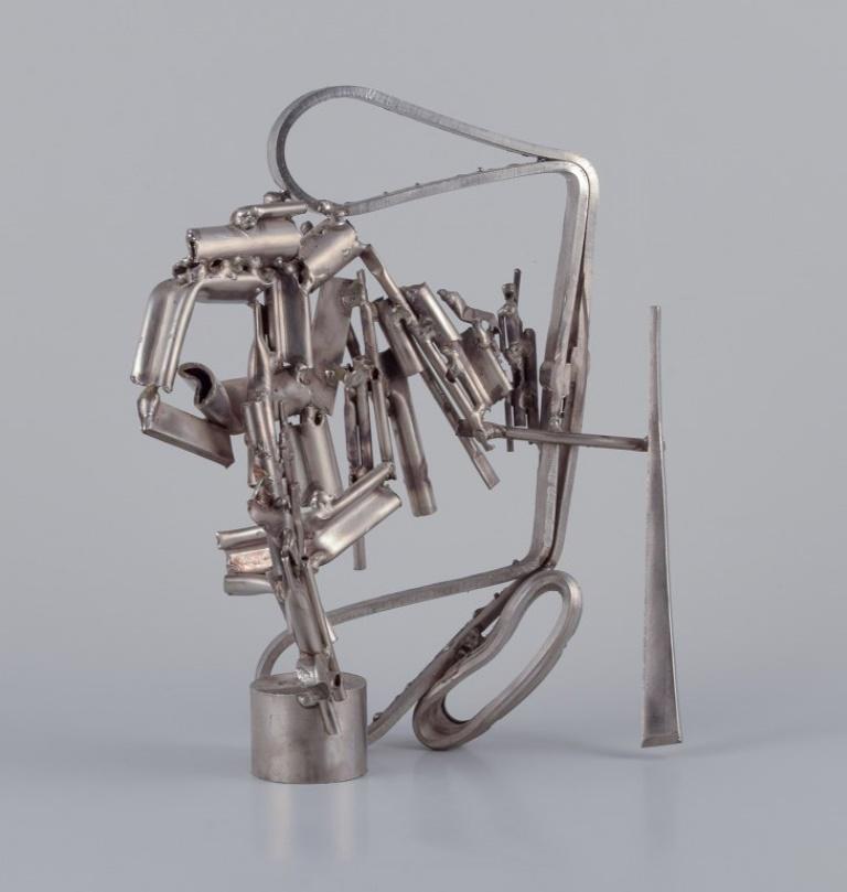 Albert Féraud (1921-2008), artista francese.
Scultura astratta in metallo.
1960.
Doppia firma A. Feraud.
Condizioni perfette.
Dimensioni: L 27,0 cm. x H. 30,5 cm.