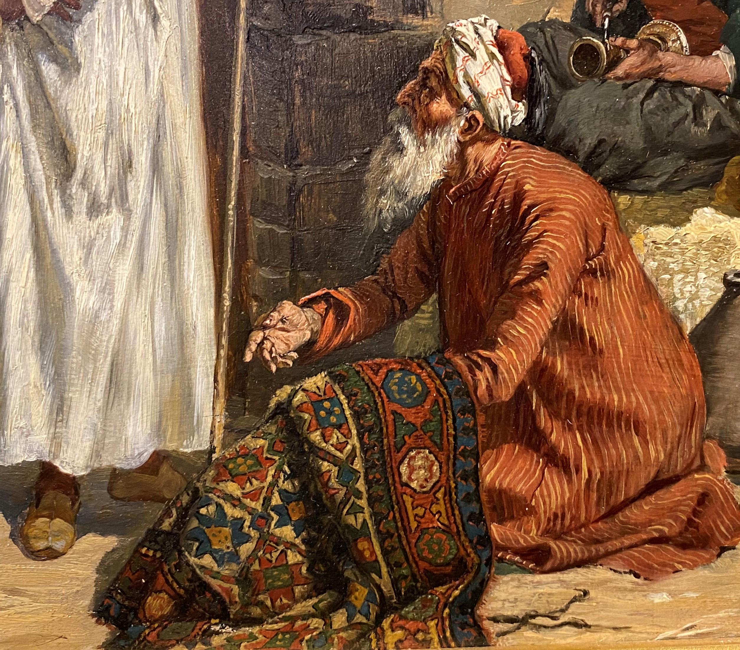A finely executed oil painting of an Oriental rug merchant in a busy marketplace by Polish/German artist Albert Joseph Franke (1860-1924). Franke was born in Breslau, Poland, studied at Breslau Academy, then at Munich Academy. He traveled widely in