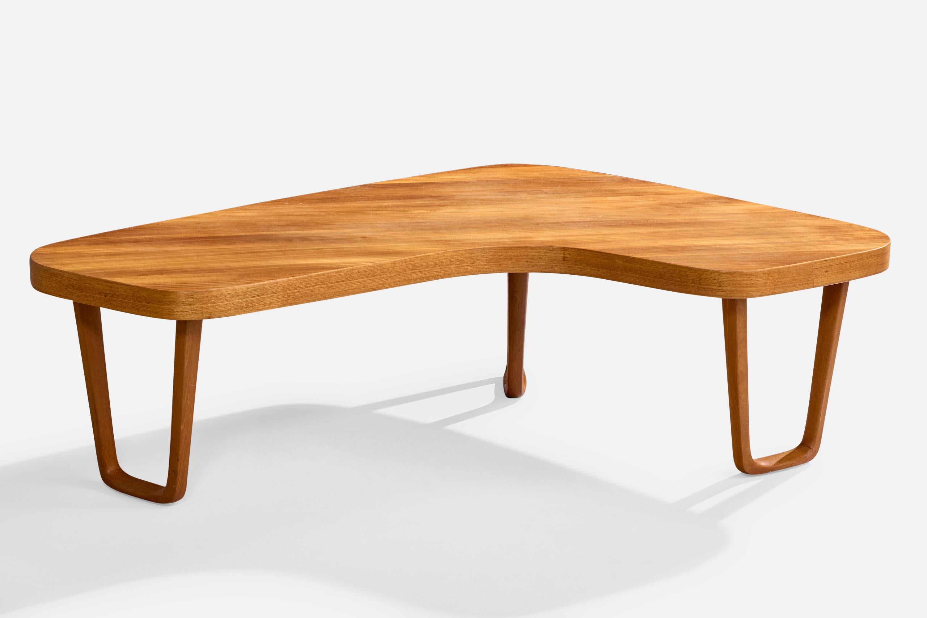 A teak coffee table designed by Albert Larsson and produced by Alberts I Tibro, Sweden, c. 1950s.

Overall Dimensions (inches): 19.75