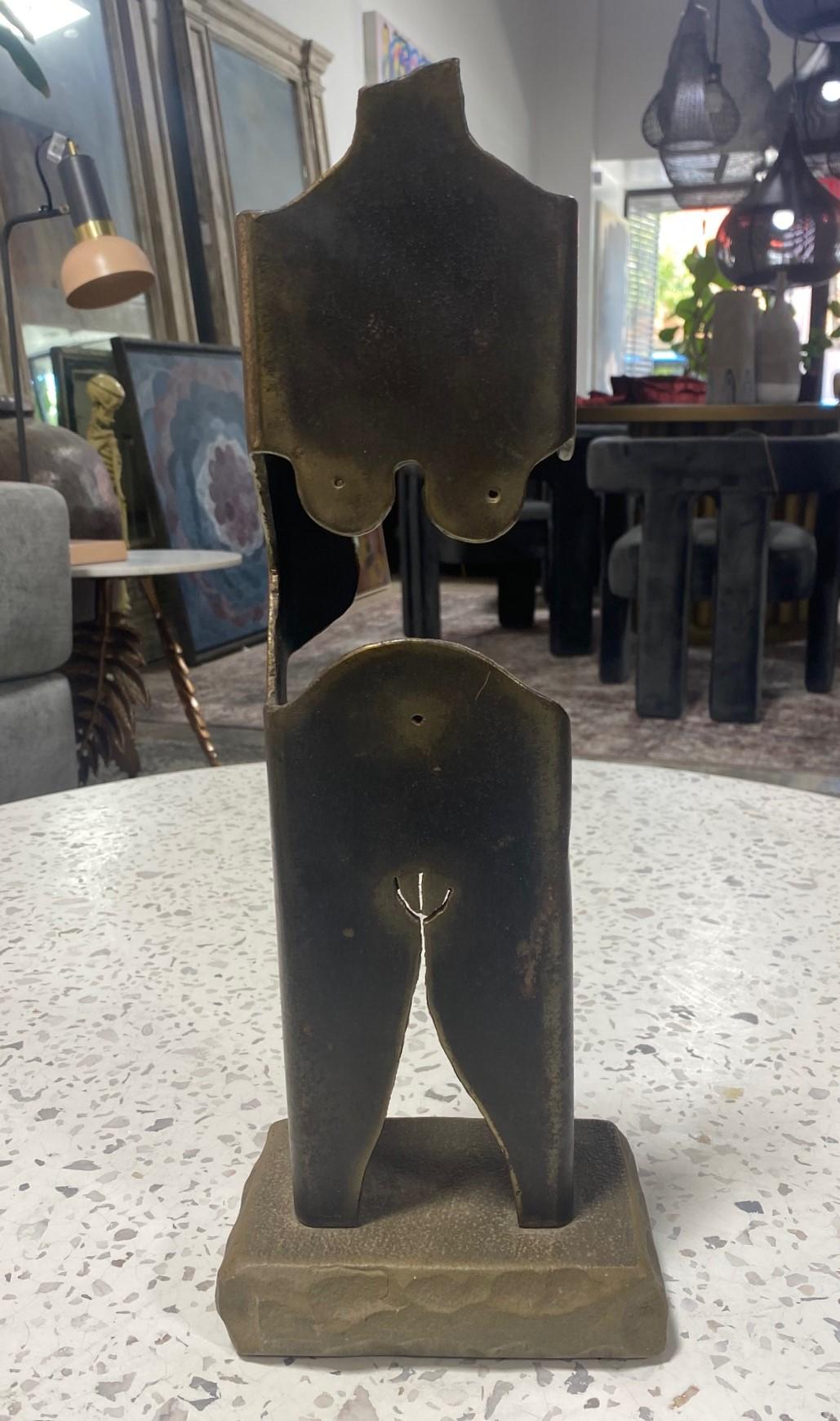A fantastic, quite whimsical, engaging Mid-century Modern abstract female nude sculpture by New York artist Albert Leon Wilson.  This is one of the best pieces we have come across of his work.  

Wilson was born in 1920 in Jamaica, New York.  In the
