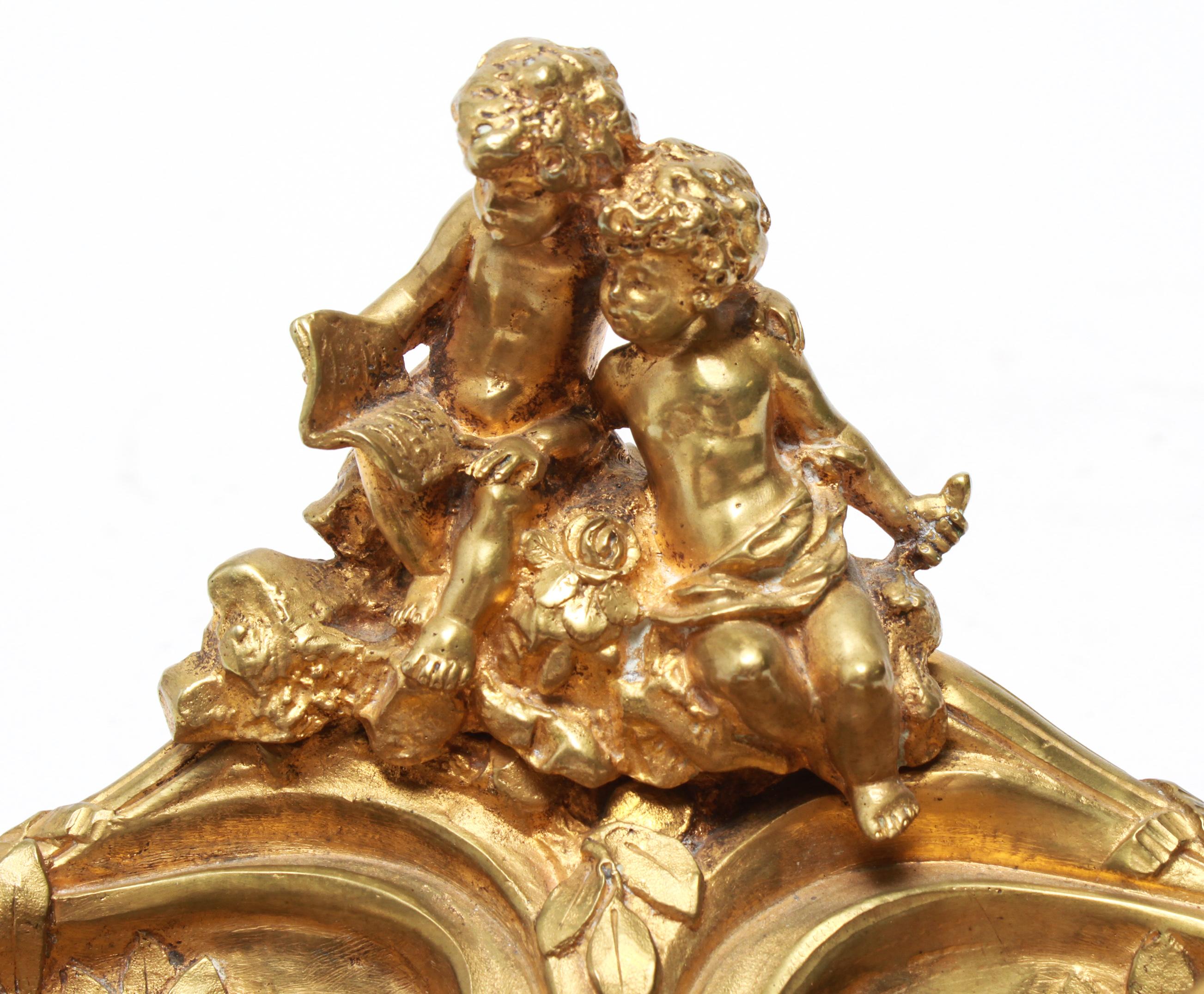 Albert Marionnet (France, 1852-1910) signed neoclassical bronze inkwell, crest depicting two children reading, signed at right: 
