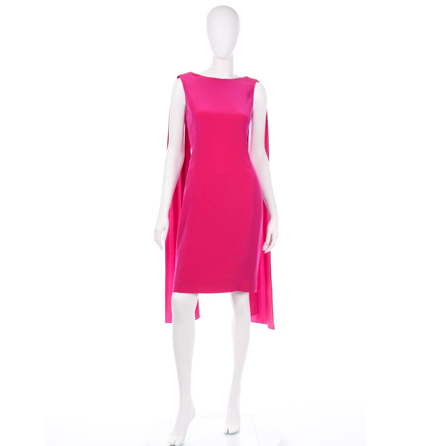 This is a stunning Albert Nipon pink sleeveless dress with a round neck, draped panels and a low back. The beautiful back is slightly v-shaped and is about 12